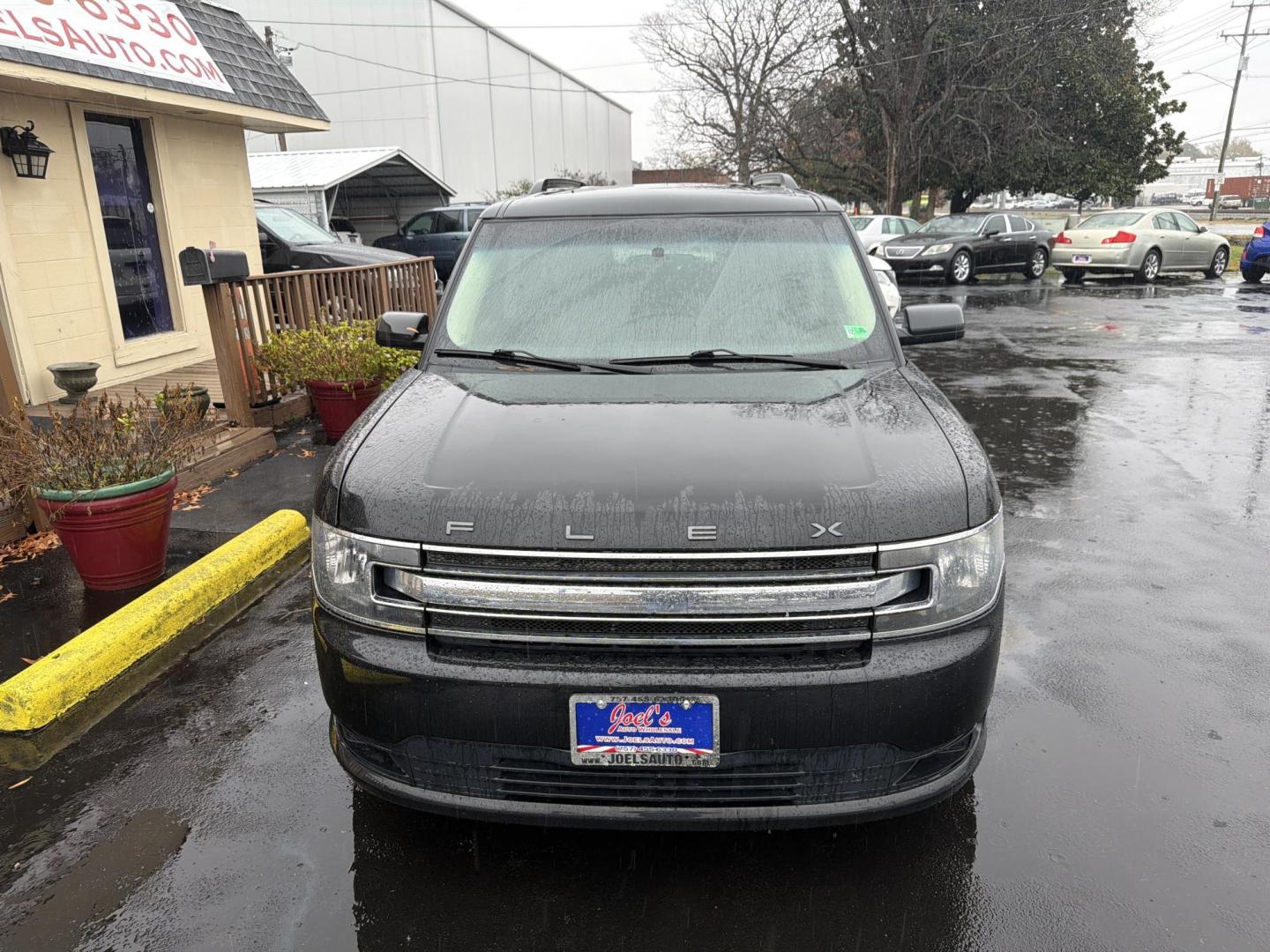 2014 Black Ford Flex SE FWD (2FMGK5B82EB) with an 3.5L V6 DOHC 24V engine, 6-Speed Automatic Overdrive transmission, located at 5700 Curlew Drive, Norfolk, VA, 23502, (757) 455-6330, 36.841885, -76.209412 - Photo#5
