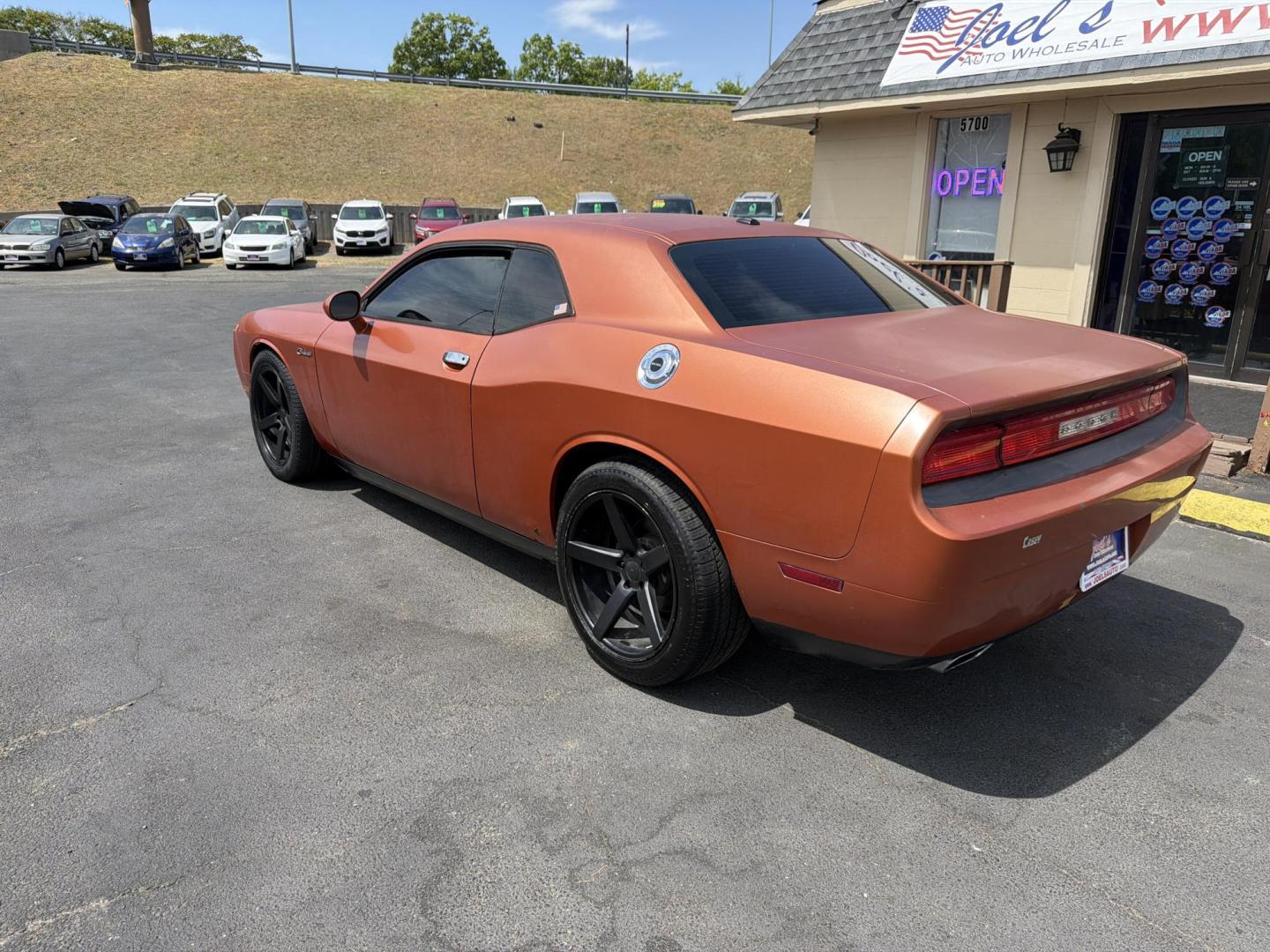 2012 Orange /black Dodge Challenger SXT (2C3CDYAG3CH) with an 3.6L V6 DOHC 24V engine, 4-Speed Automatic transmission, located at 5700 Curlew Drive, Norfolk, VA, 23502, (757) 455-6330, 36.841885, -76.209412 - Photo#1