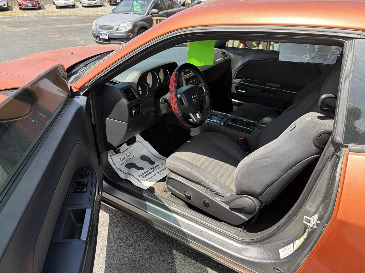 2012 Orange /black Dodge Challenger SXT (2C3CDYAG3CH) with an 3.6L V6 DOHC 24V engine, 4-Speed Automatic transmission, located at 5700 Curlew Drive, Norfolk, VA, 23502, (757) 455-6330, 36.841885, -76.209412 - Photo#5