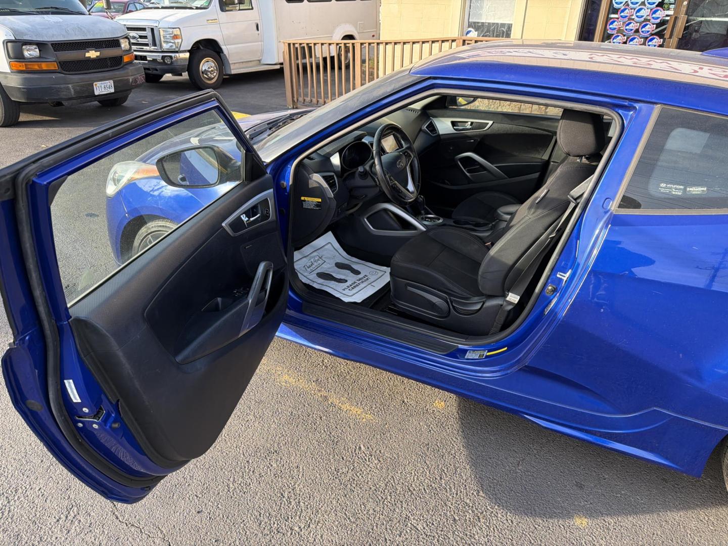 2013 Blue Hyundai Veloster Base (KMHTC6AD5DU) with an 1.6L L4 DOHC 16V engine, located at 5700 Curlew Drive, Norfolk, VA, 23502, (757) 455-6330, 36.841885, -76.209412 - Photo#7