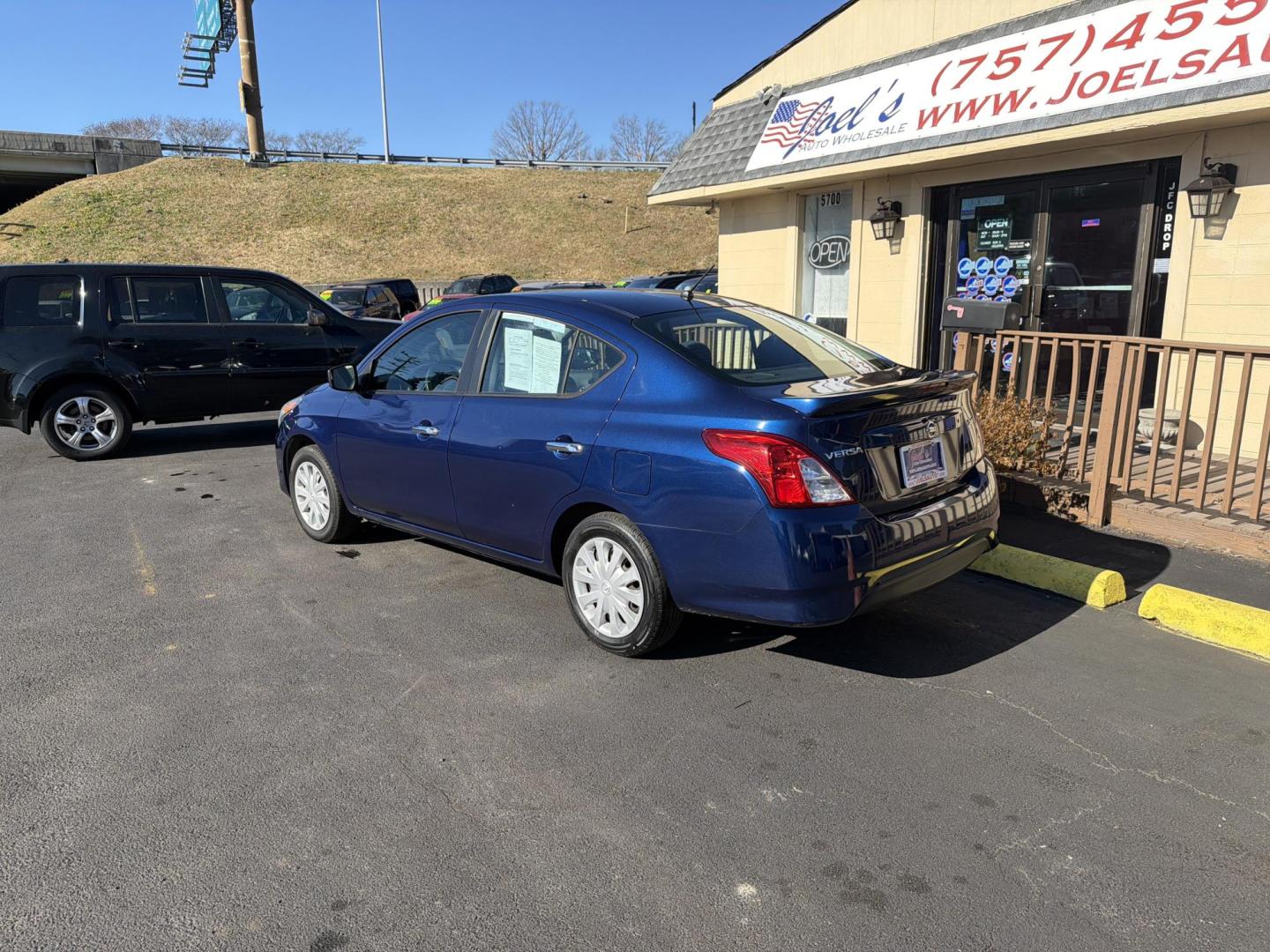 2019 Blue Nissan Versa 1.6 SV Sedan (3N1CN7AP2KL) with an 1.6L L4 DOHC 16V engine, CVT transmission, located at 5700 Curlew Drive, Norfolk, VA, 23502, (757) 455-6330, 36.841885, -76.209412 - Photo#1