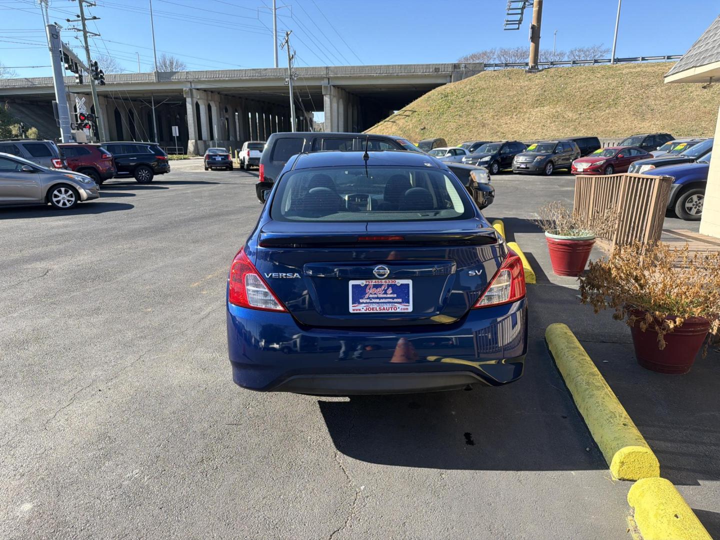 2019 Blue Nissan Versa 1.6 SV Sedan (3N1CN7AP2KL) with an 1.6L L4 DOHC 16V engine, CVT transmission, located at 5700 Curlew Drive, Norfolk, VA, 23502, (757) 455-6330, 36.841885, -76.209412 - Photo#2