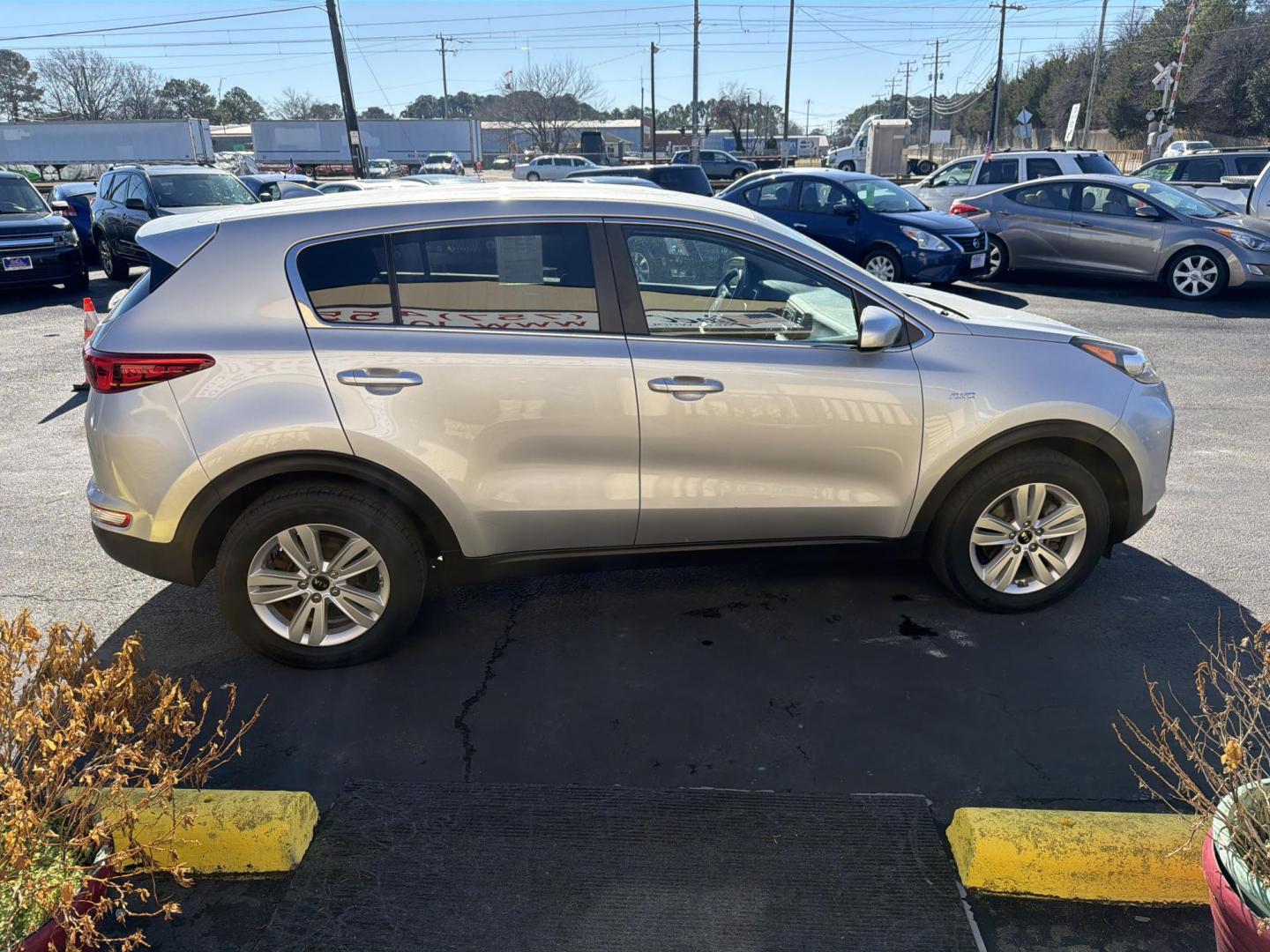 2019 Silver /black Kia Sportage LX AWD (KNDPMCAC6K7) with an 2.4L V6 DOHC 24V engine, 6A transmission, located at 5700 Curlew Drive, Norfolk, VA, 23502, (757) 455-6330, 36.841885, -76.209412 - Photo#3