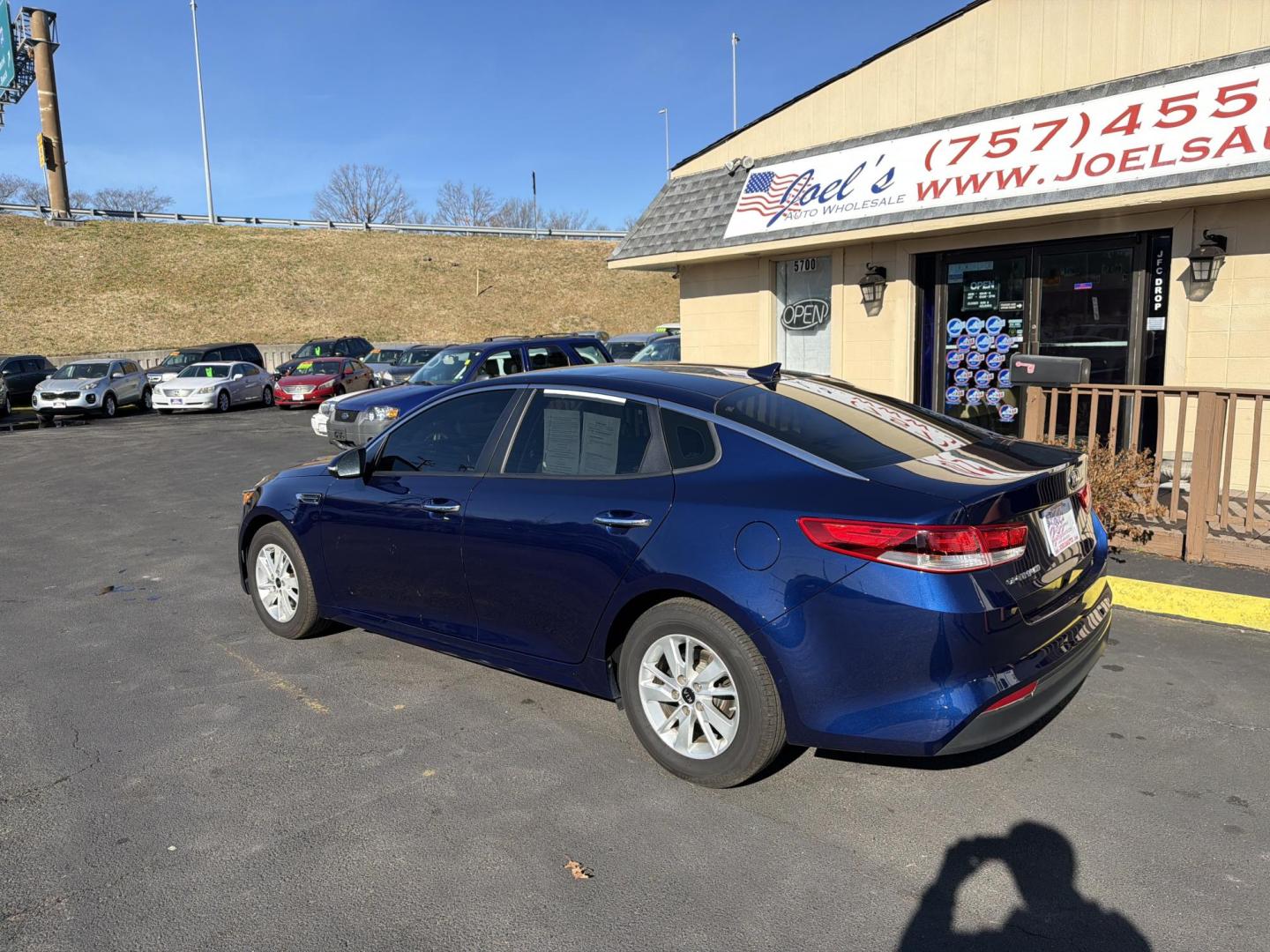 2016 Blue Kia Optima LX (5XXGT4L3XGG) with an 2.4L L4 DOHC 16V engine, 6A transmission, located at 5700 Curlew Drive, Norfolk, VA, 23502, (757) 455-6330, 36.841885, -76.209412 - Photo#1