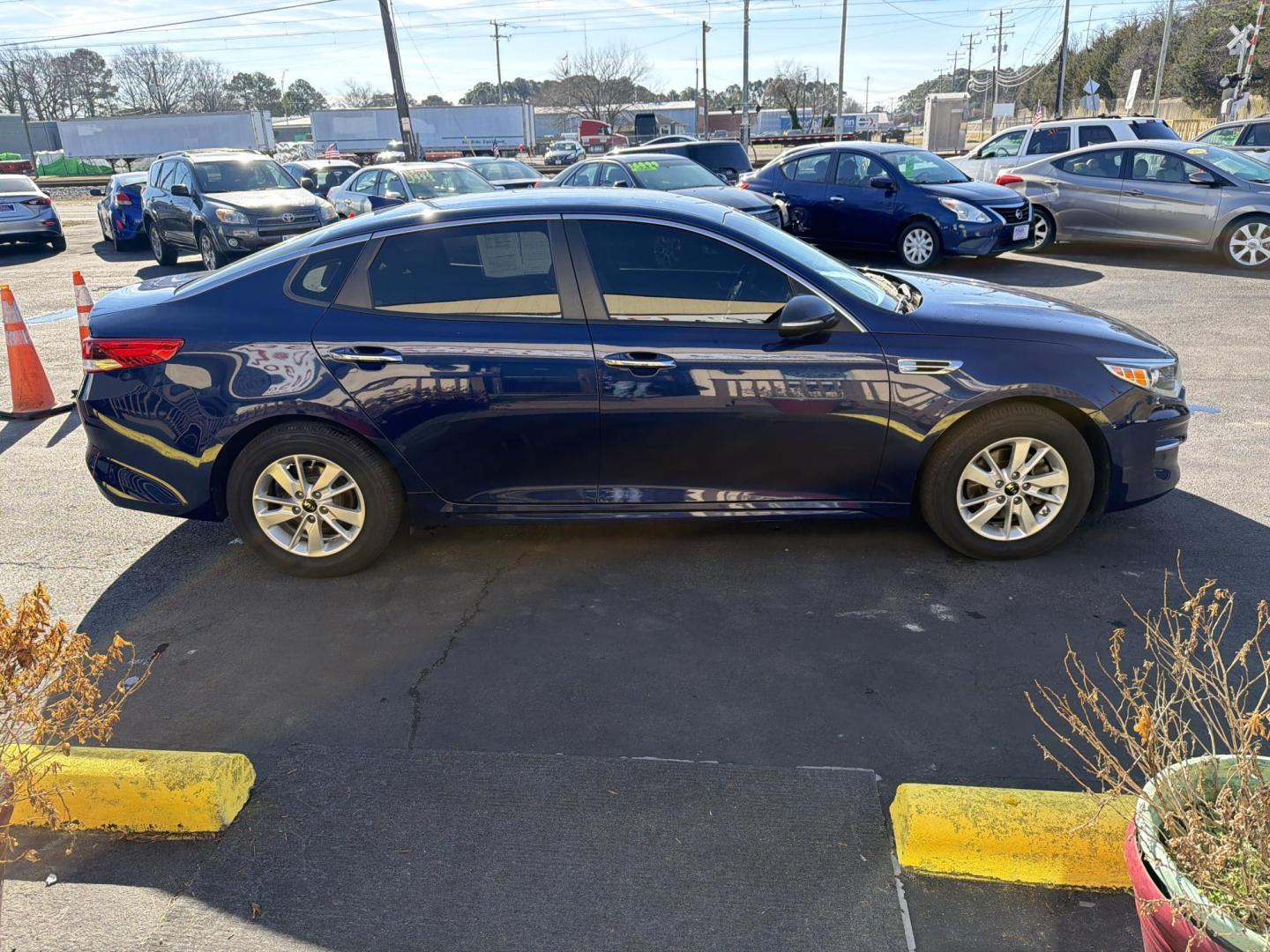 2016 Blue Kia Optima LX (5XXGT4L3XGG) with an 2.4L L4 DOHC 16V engine, 6A transmission, located at 5700 Curlew Drive, Norfolk, VA, 23502, (757) 455-6330, 36.841885, -76.209412 - Photo#3
