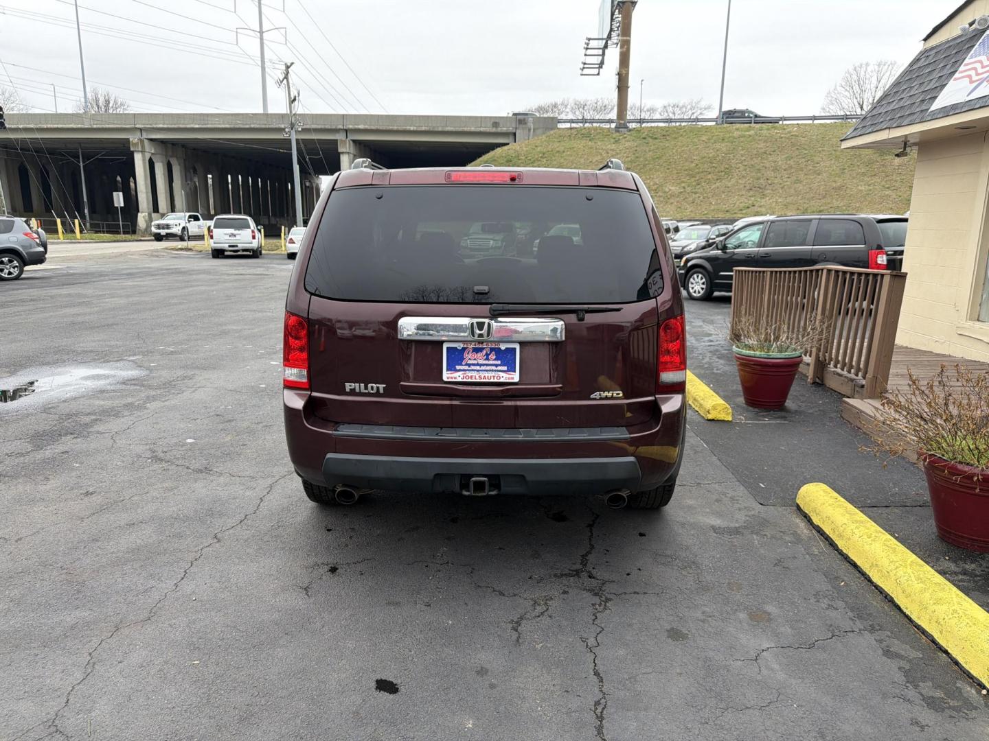 2011 Burgandy Honda Pilot EX-L 4WD 5-Spd AT (5FNYF4H54BB) with an 3.5L V6 SOHC 24V engine, 5-Speed Automatic transmission, located at 5700 Curlew Drive, Norfolk, VA, 23502, (757) 455-6330, 36.841885, -76.209412 - Photo#2