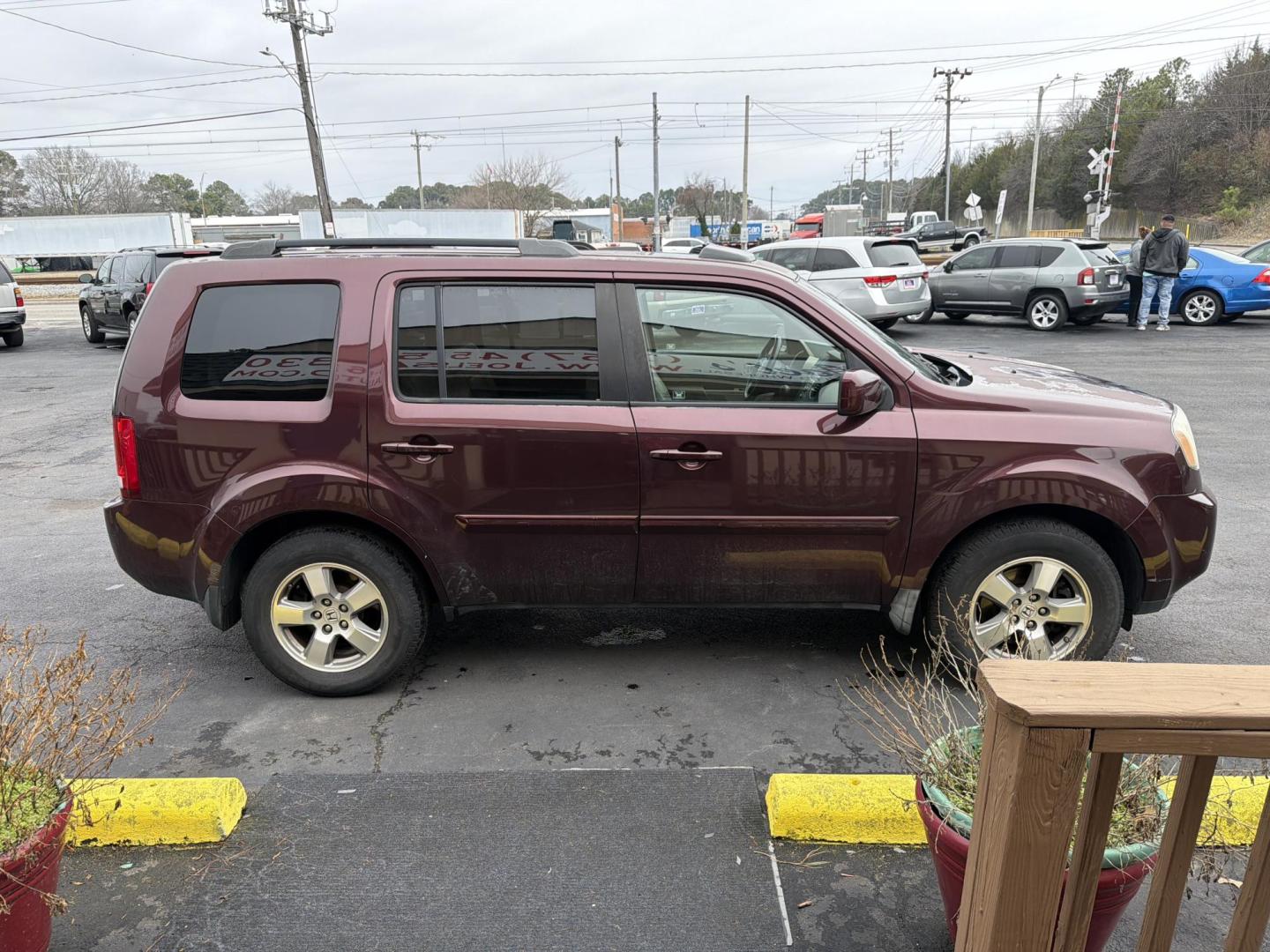 2011 Burgandy Honda Pilot EX-L 4WD 5-Spd AT (5FNYF4H54BB) with an 3.5L V6 SOHC 24V engine, 5-Speed Automatic transmission, located at 5700 Curlew Drive, Norfolk, VA, 23502, (757) 455-6330, 36.841885, -76.209412 - Photo#3