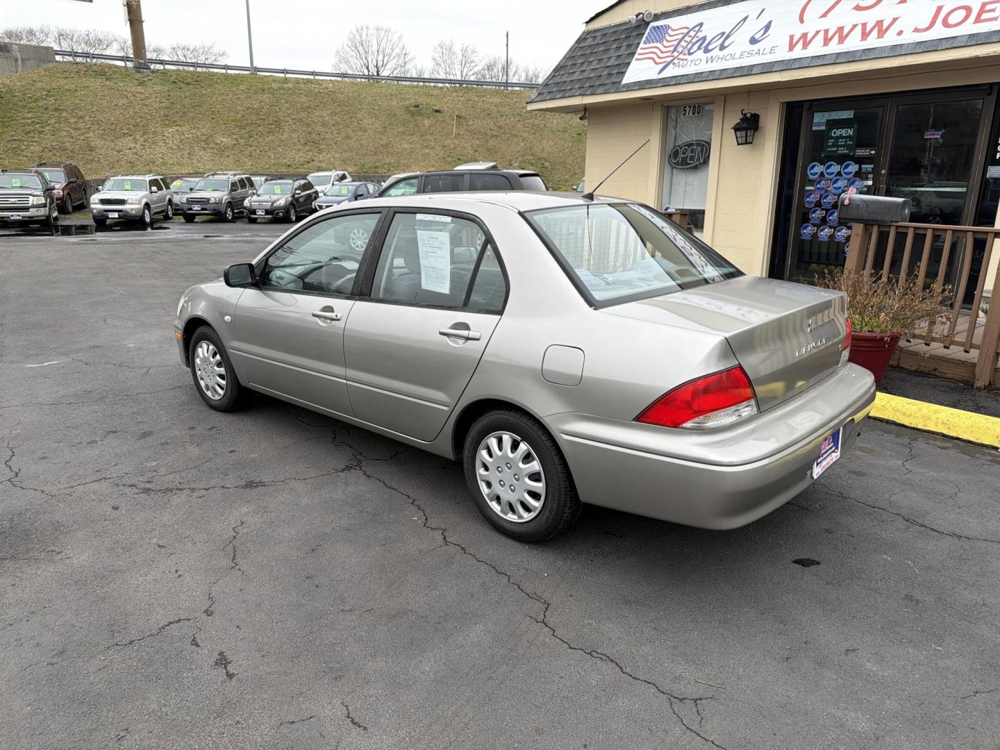 2002 Silver /Gray Mitsubishi Lancer ES (JA3AJ26E72U) with an 2.0L L4 DOHC 16V engine, located at 5700 Curlew Drive, Norfolk, VA, 23502, (757) 455-6330, 36.841885, -76.209412 - Photo#1
