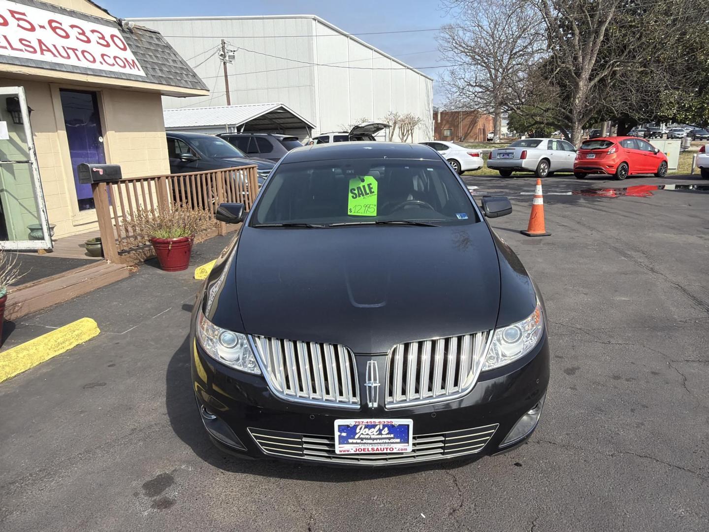 2009 Black Lincoln MKS AWD (1LNHM94R29G) with an 3.7L V6 DOHC 24V engine, 6-Speed Automatic Overdrive transmission, located at 5700 Curlew Drive, Norfolk, VA, 23502, (757) 455-6330, 36.841885, -76.209412 - Photo#4