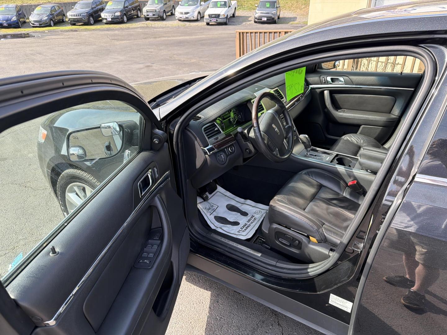 2009 Black Lincoln MKS AWD (1LNHM94R29G) with an 3.7L V6 DOHC 24V engine, 6-Speed Automatic Overdrive transmission, located at 5700 Curlew Drive, Norfolk, VA, 23502, (757) 455-6330, 36.841885, -76.209412 - Photo#5