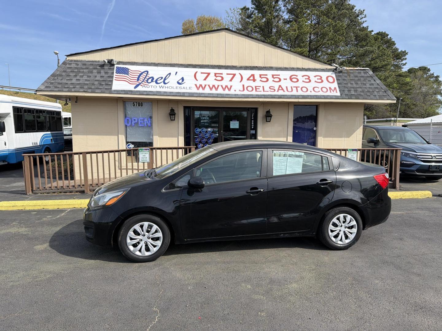 2014 Black Kia Rio LX (KNADM4A32E6) with an 1.6L L4 DOHC 16V engine, 6-Speed Automatic transmission, located at 5700 Curlew Dr., Norfolk, VA, 23502, (703) 554-4373, 36.841885, -76.209412 - Photo#0