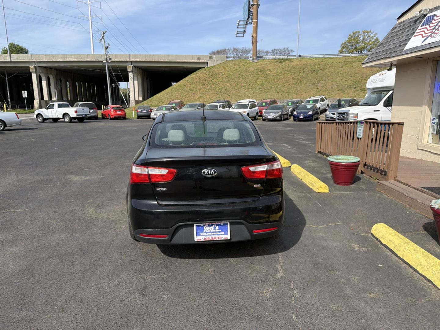 2014 Black Kia Rio LX (KNADM4A32E6) with an 1.6L L4 DOHC 16V engine, 6-Speed Automatic transmission, located at 5700 Curlew Dr., Norfolk, VA, 23502, (703) 554-4373, 36.841885, -76.209412 - Photo#2