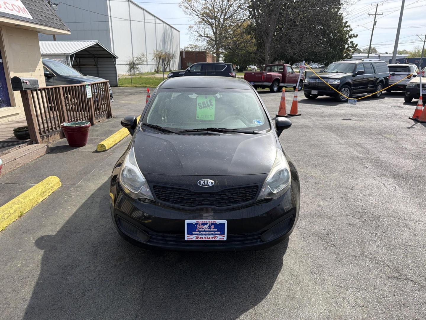 2014 Black Kia Rio LX (KNADM4A32E6) with an 1.6L L4 DOHC 16V engine, 6-Speed Automatic transmission, located at 5700 Curlew Dr., Norfolk, VA, 23502, (703) 554-4373, 36.841885, -76.209412 - Photo#4