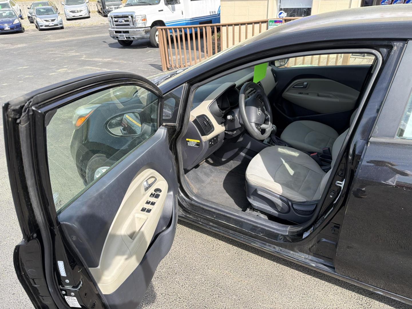 2014 Black Kia Rio LX (KNADM4A32E6) with an 1.6L L4 DOHC 16V engine, 6-Speed Automatic transmission, located at 5700 Curlew Dr., Norfolk, VA, 23502, (703) 554-4373, 36.841885, -76.209412 - Photo#5