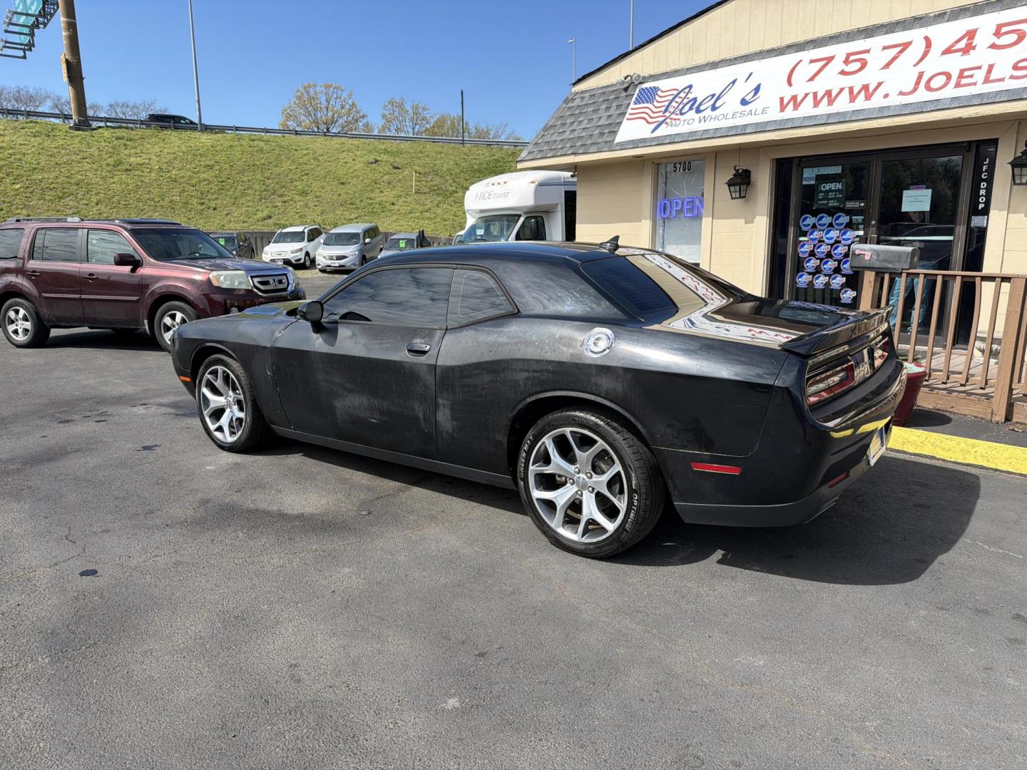 2016 Black Dodge Challenger SXT (2C3CDZAG8GH) with an 3.6L V6 DOHC 24V engine, 5A transmission, located at 5700 Curlew Drive, Norfolk, VA, 23502, (757) 455-6330, 36.841885, -76.209412 - Photo#1