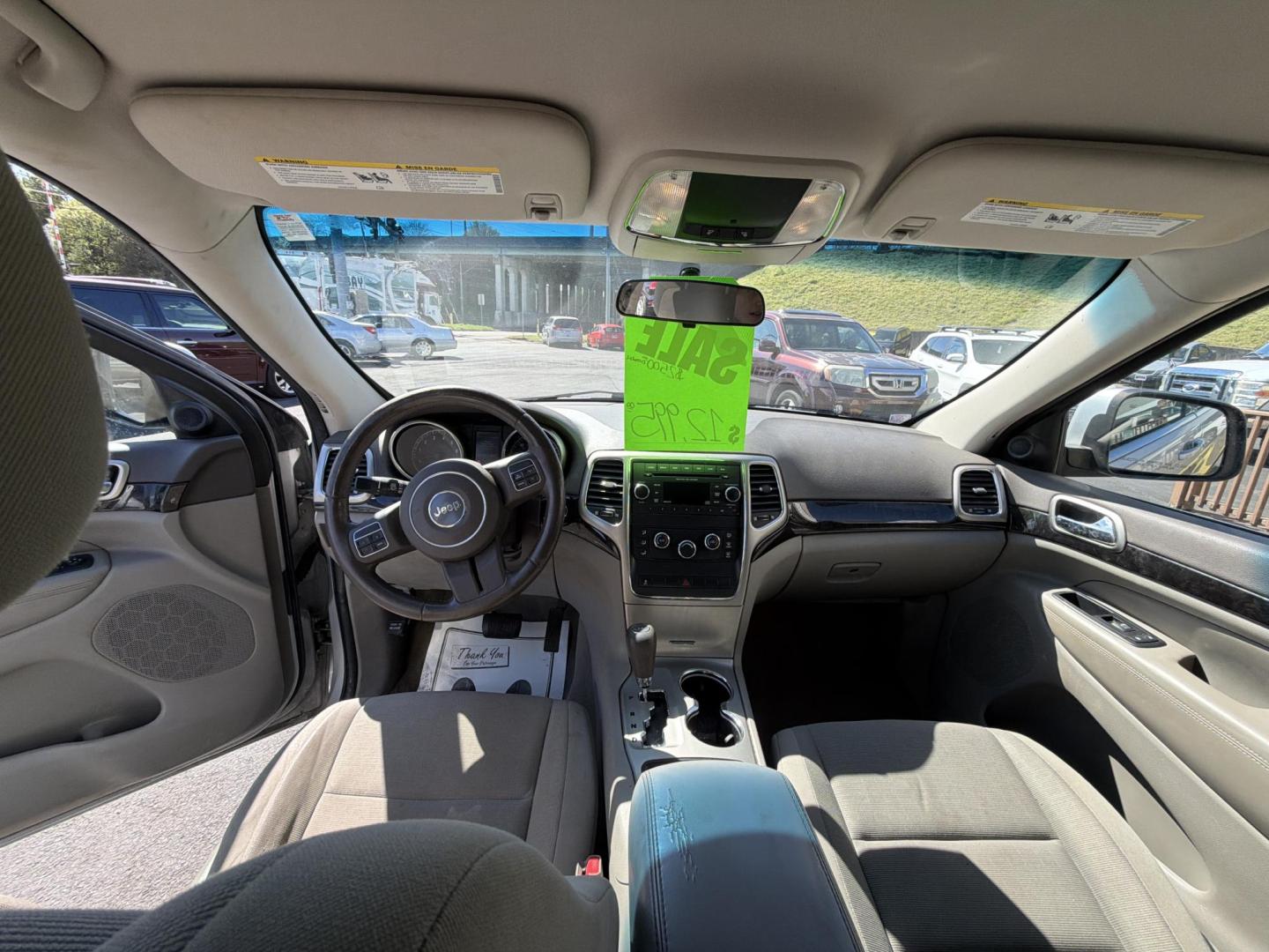 2012 Silver Jeep Grand Cherokee Laredo 4WD (1C4RJFAG8CC) with an 3.6L V6 DOHC 24V engine, 5-Speed Automatic transmission, located at 5700 Curlew Drive, Norfolk, VA, 23502, (757) 455-6330, 36.841885, -76.209412 - Photo#6