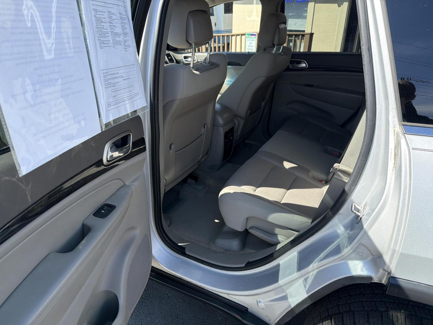 2012 Silver Jeep Grand Cherokee Laredo 4WD (1C4RJFAG8CC) with an 3.6L V6 DOHC 24V engine, 5-Speed Automatic transmission, located at 5700 Curlew Drive, Norfolk, VA, 23502, (757) 455-6330, 36.841885, -76.209412 - Photo#7