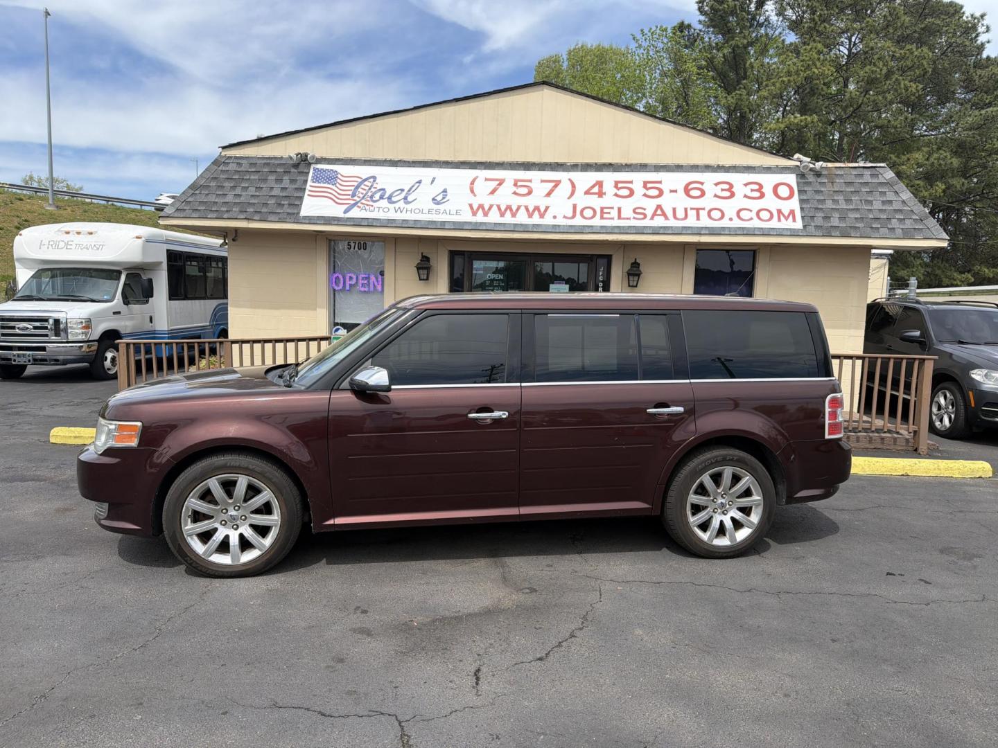 2009 Burgandy Ford Flex Limited AWD (2FMEK63CX9B) with an 3.5L V6 DOHC 24V engine, 6-Speed Automatic transmission, located at 5700 Curlew Drive, Norfolk, VA, 23502, (757) 455-6330, 36.841885, -76.209412 - Photo#0
