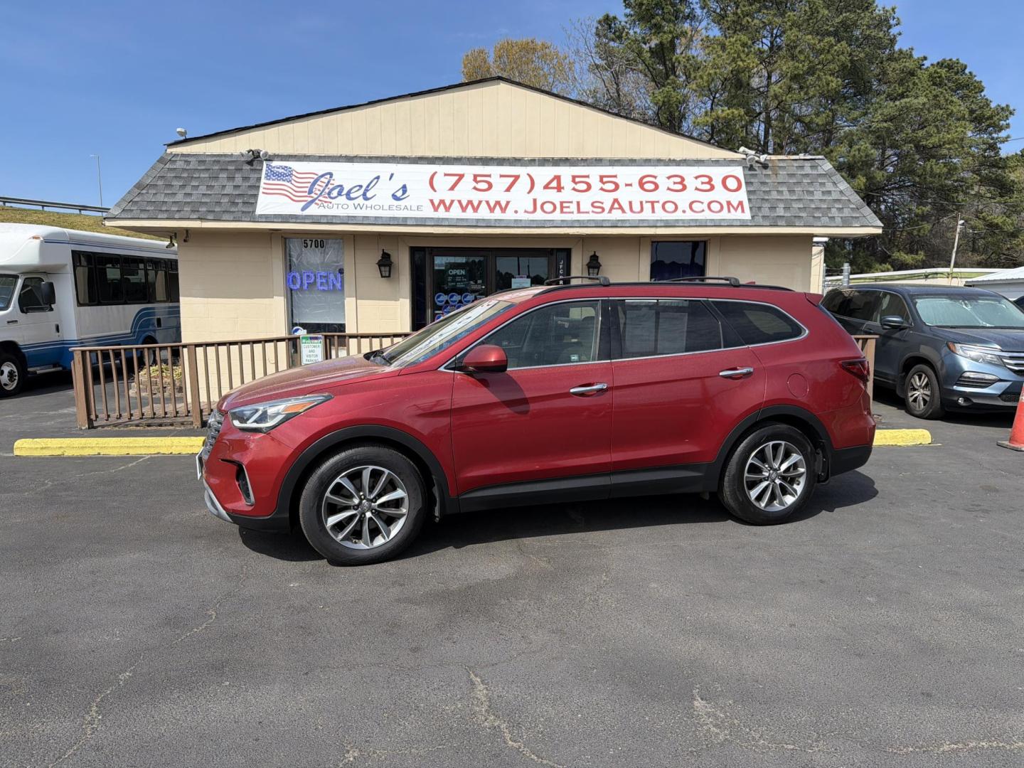 2017 red Hyundai Santa Fe SE AWD (KM8SMDHF6HU) with an 3.3L V6 DOHC 24V engine, 6A transmission, located at 5700 Curlew Drive, Norfolk, VA, 23502, (757) 455-6330, 36.841885, -76.209412 - Photo#0