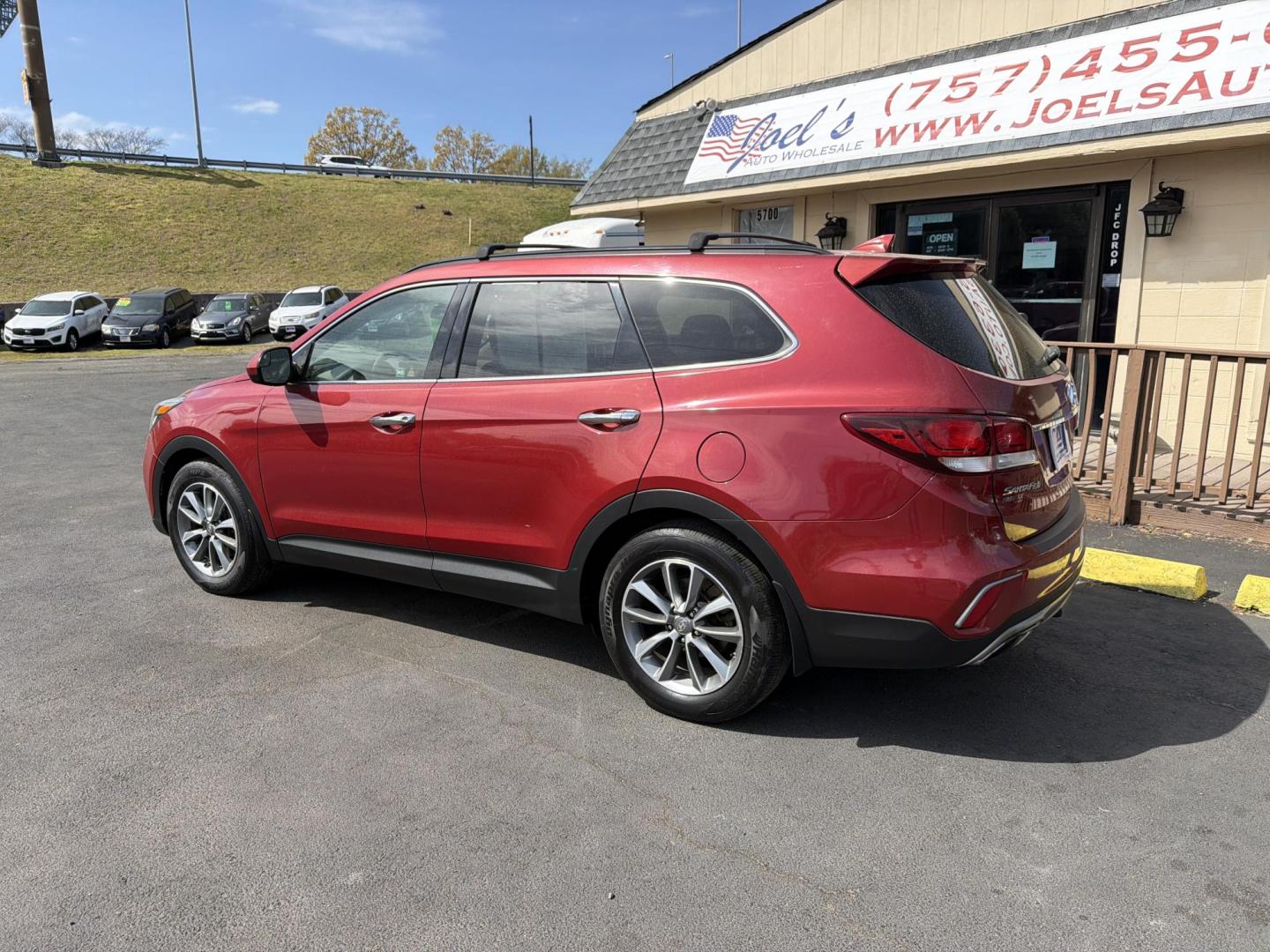 2017 red Hyundai Santa Fe SE AWD (KM8SMDHF6HU) with an 3.3L V6 DOHC 24V engine, 6A transmission, located at 5700 Curlew Drive, Norfolk, VA, 23502, (757) 455-6330, 36.841885, -76.209412 - Photo#1