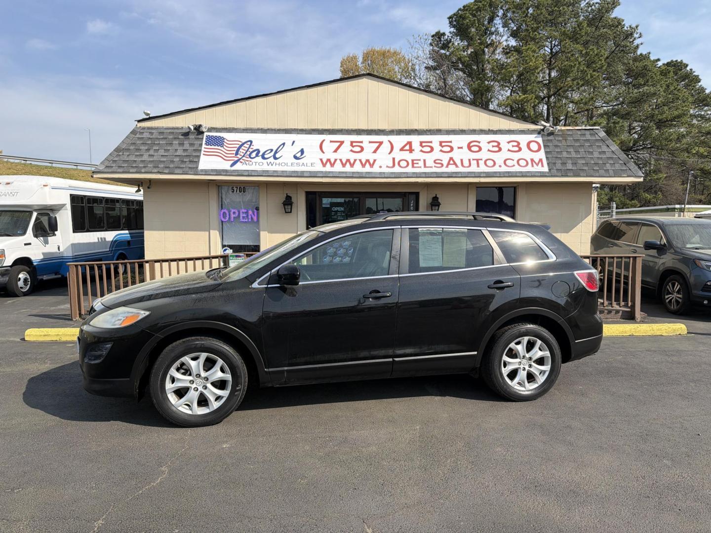 2011 Black Mazda CX-9 Touring AWD (JM3TB3CVXB0) with an 3.7L V6 DOHC 24V engine, 6-Speed Automatic transmission, located at 5700 Curlew Drive, Norfolk, VA, 23502, (757) 455-6330, 36.841885, -76.209412 - Photo#0