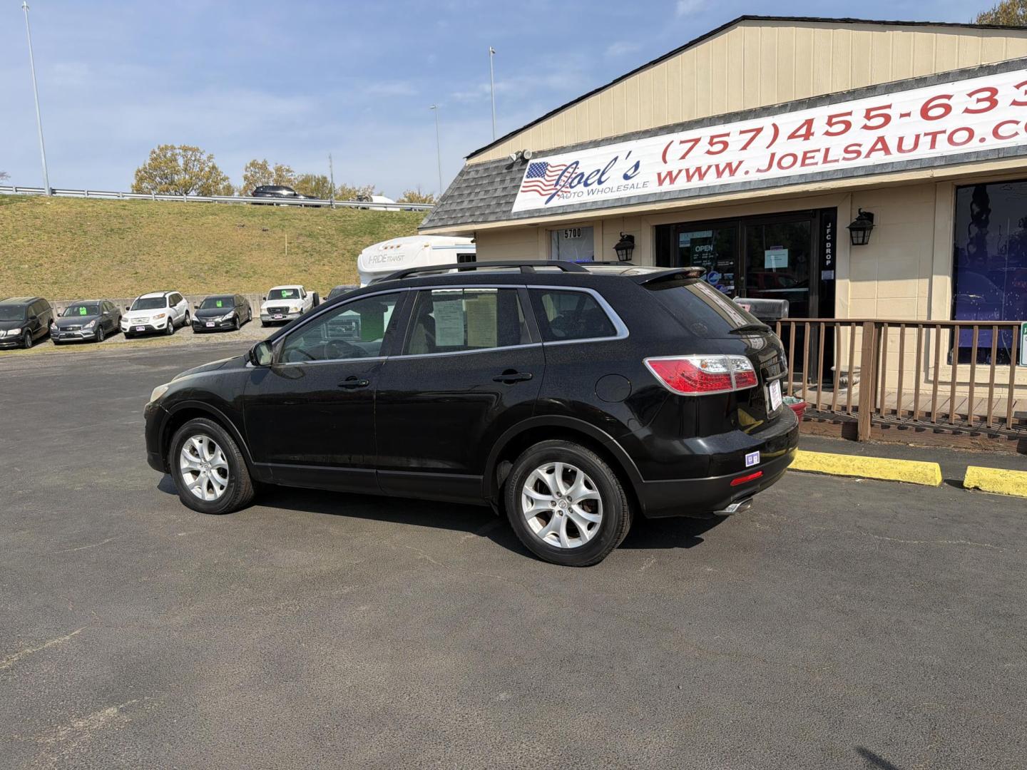 2011 Black Mazda CX-9 Touring AWD (JM3TB3CVXB0) with an 3.7L V6 DOHC 24V engine, 6-Speed Automatic transmission, located at 5700 Curlew Drive, Norfolk, VA, 23502, (757) 455-6330, 36.841885, -76.209412 - Photo#1