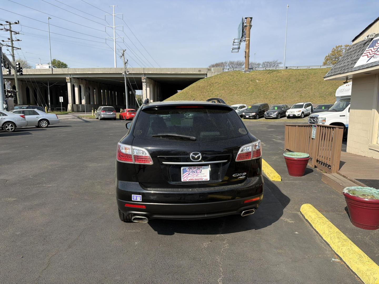 2011 Black Mazda CX-9 Touring AWD (JM3TB3CVXB0) with an 3.7L V6 DOHC 24V engine, 6-Speed Automatic transmission, located at 5700 Curlew Drive, Norfolk, VA, 23502, (757) 455-6330, 36.841885, -76.209412 - Photo#2