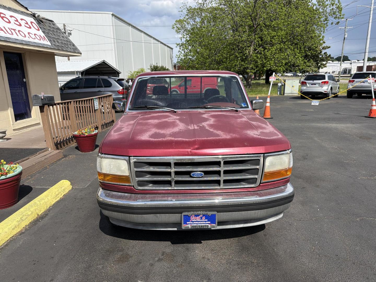 1992 red Ford F-150 Custom Reg. Cab Long Bed 2WD (1FTCF15N4NK) with an 5.0L V8 OHV 16V engine, 4-Speed Automatic Overdrive transmission, located at 5700 Curlew Drive, Norfolk, VA, 23502, (757) 455-6330, 36.841885, -76.209412 - Photo#4