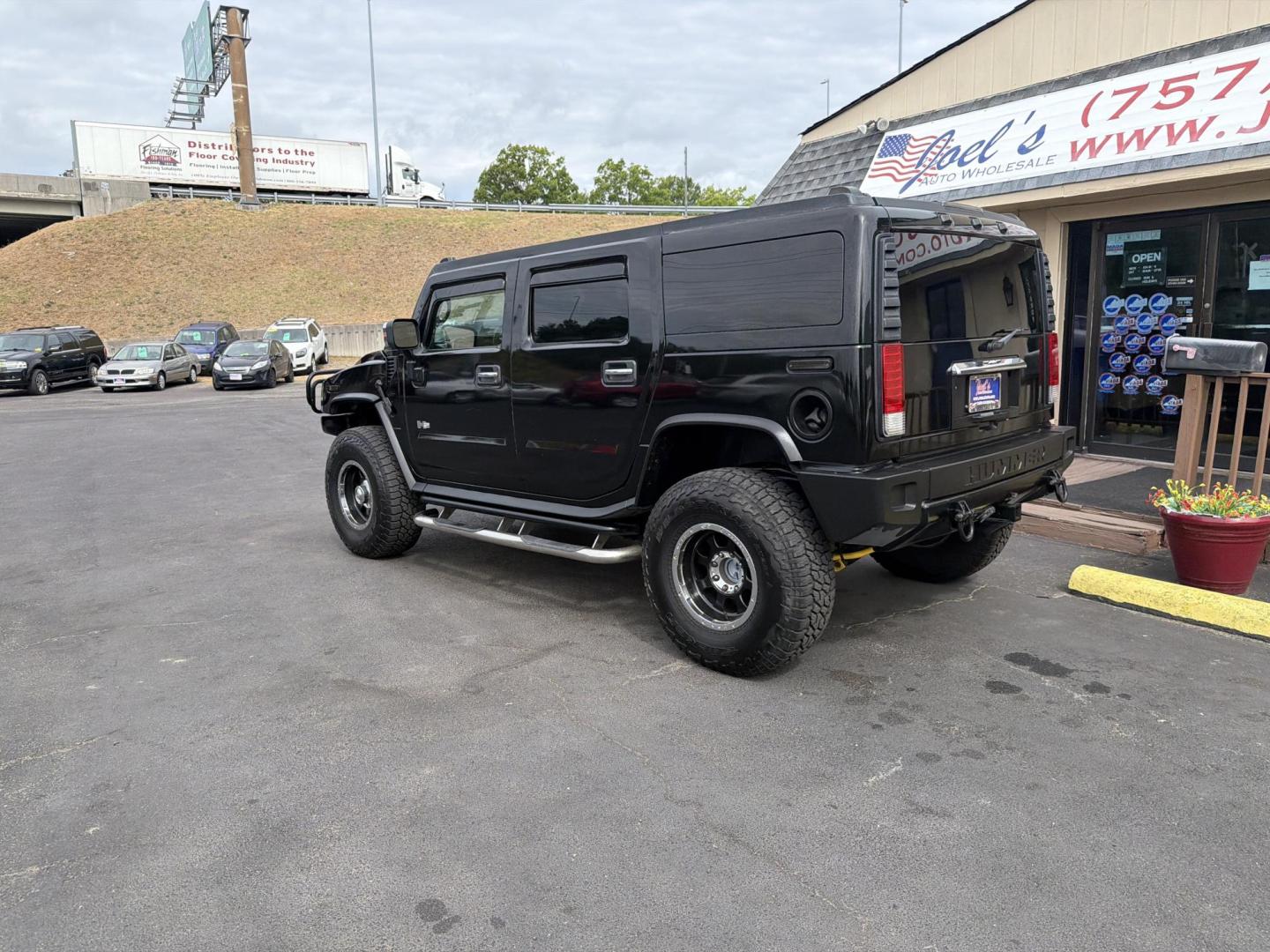 2003 Black /Tan Hummer H2 Sport Utility (5GRGN23U73H) with an 6.0L V8 OHV 16V engine, 4-Speed Automatic Overdrive transmission, located at 5700 Curlew Drive, Norfolk, VA, 23502, (757) 455-6330, 36.841885, -76.209412 - Photo#1