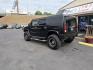 2003 Black /Tan Hummer H2 Sport Utility (5GRGN23U73H) with an 6.0L V8 OHV 16V engine, 4-Speed Automatic Overdrive transmission, located at 5700 Curlew Drive, Norfolk, VA, 23502, (757) 455-6330, 36.841885, -76.209412 - Photo#1