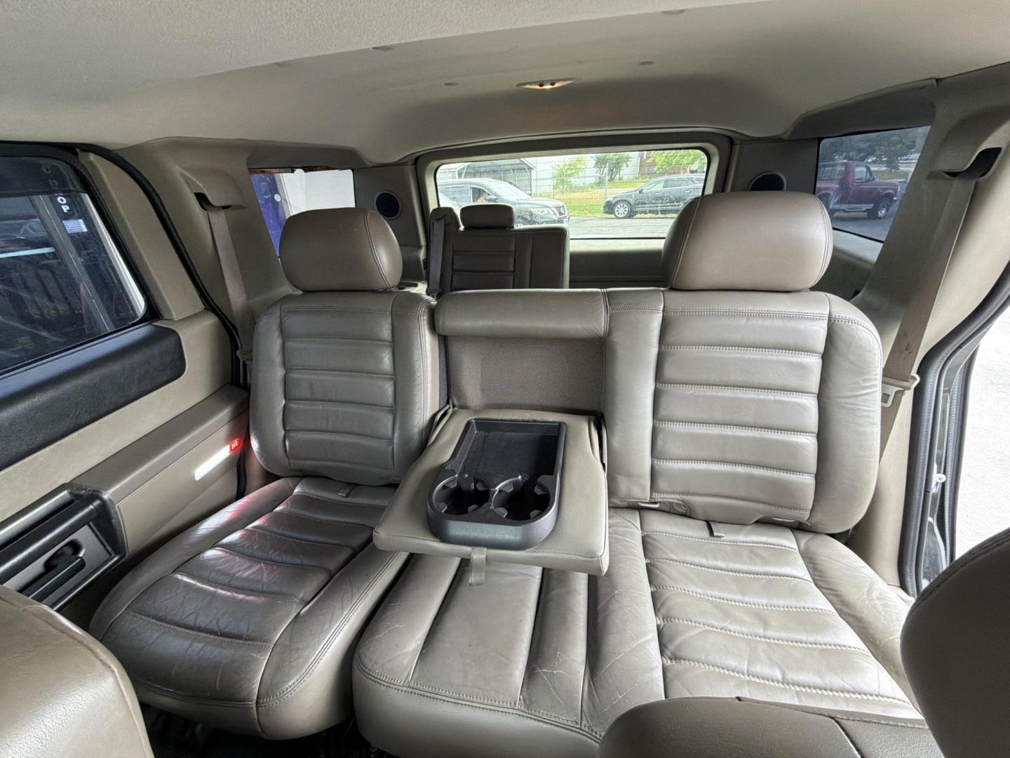 2003 Black /Tan Hummer H2 Sport Utility (5GRGN23U73H) with an 6.0L V8 OHV 16V engine, 4-Speed Automatic Overdrive transmission, located at 5700 Curlew Drive, Norfolk, VA, 23502, (757) 455-6330, 36.841885, -76.209412 - Photo#8