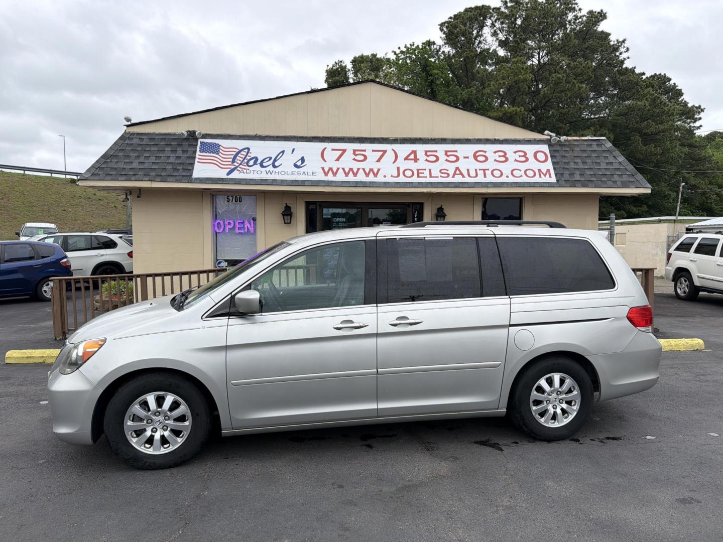 2009 Silver Honda Odyssey EX (5FNRL38429B) with an 3.5L V6 SOHC 24V engine, 5-Speed Automatic transmission, located at 5700 Curlew Drive, Norfolk, VA, 23502, (757) 455-6330, 36.841885, -76.209412 - Photo#0