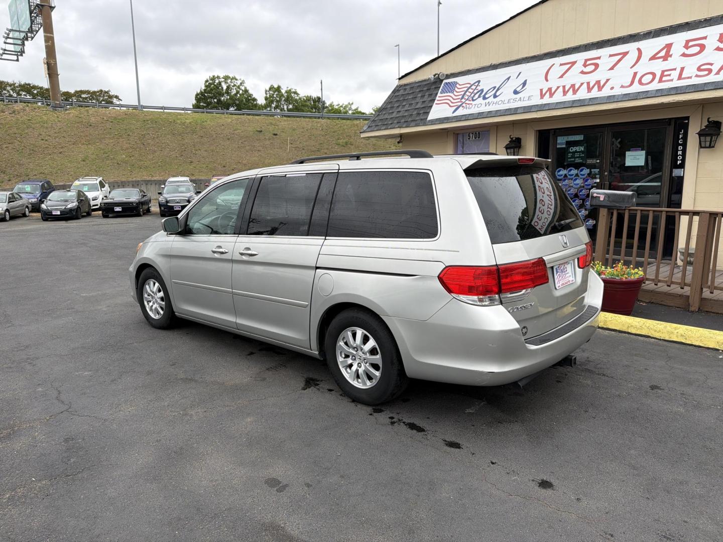 2009 Silver Honda Odyssey EX (5FNRL38429B) with an 3.5L V6 SOHC 24V engine, 5-Speed Automatic transmission, located at 5700 Curlew Drive, Norfolk, VA, 23502, (757) 455-6330, 36.841885, -76.209412 - Photo#1