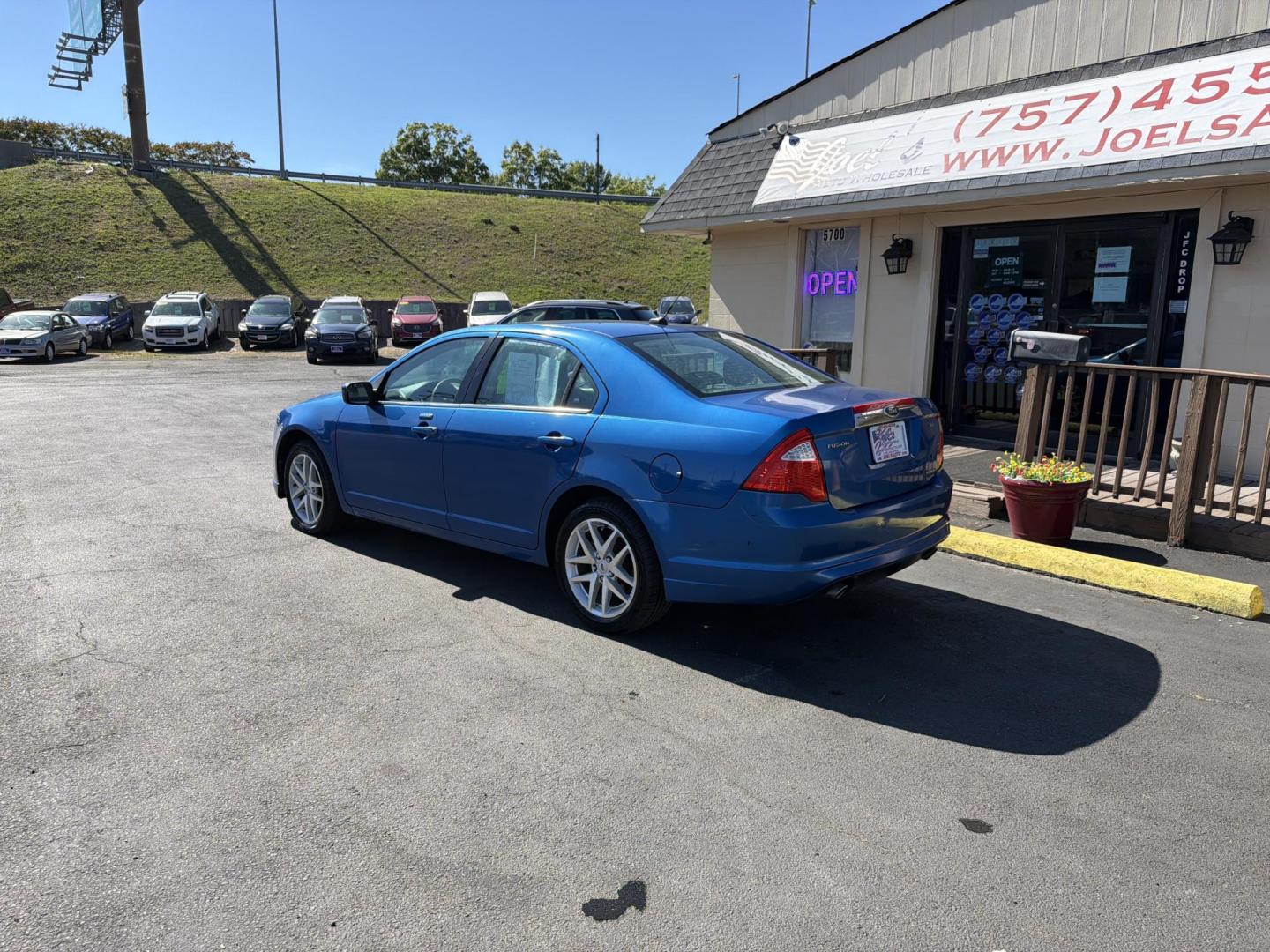 2012 Blue Ford Fusion SEL (3FAHP0JG0CR) with an 3.0L V6 DOHC 24V engine, located at 5700 Curlew Drive, Norfolk, VA, 23502, (757) 455-6330, 36.841885, -76.209412 - Photo#1