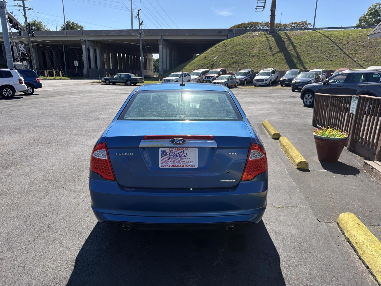 2012 Blue Ford Fusion SEL (3FAHP0JG0CR) with an 3.0L V6 DOHC 24V engine, located at 5700 Curlew Drive, Norfolk, VA, 23502, (757) 455-6330, 36.841885, -76.209412 - Photo#2