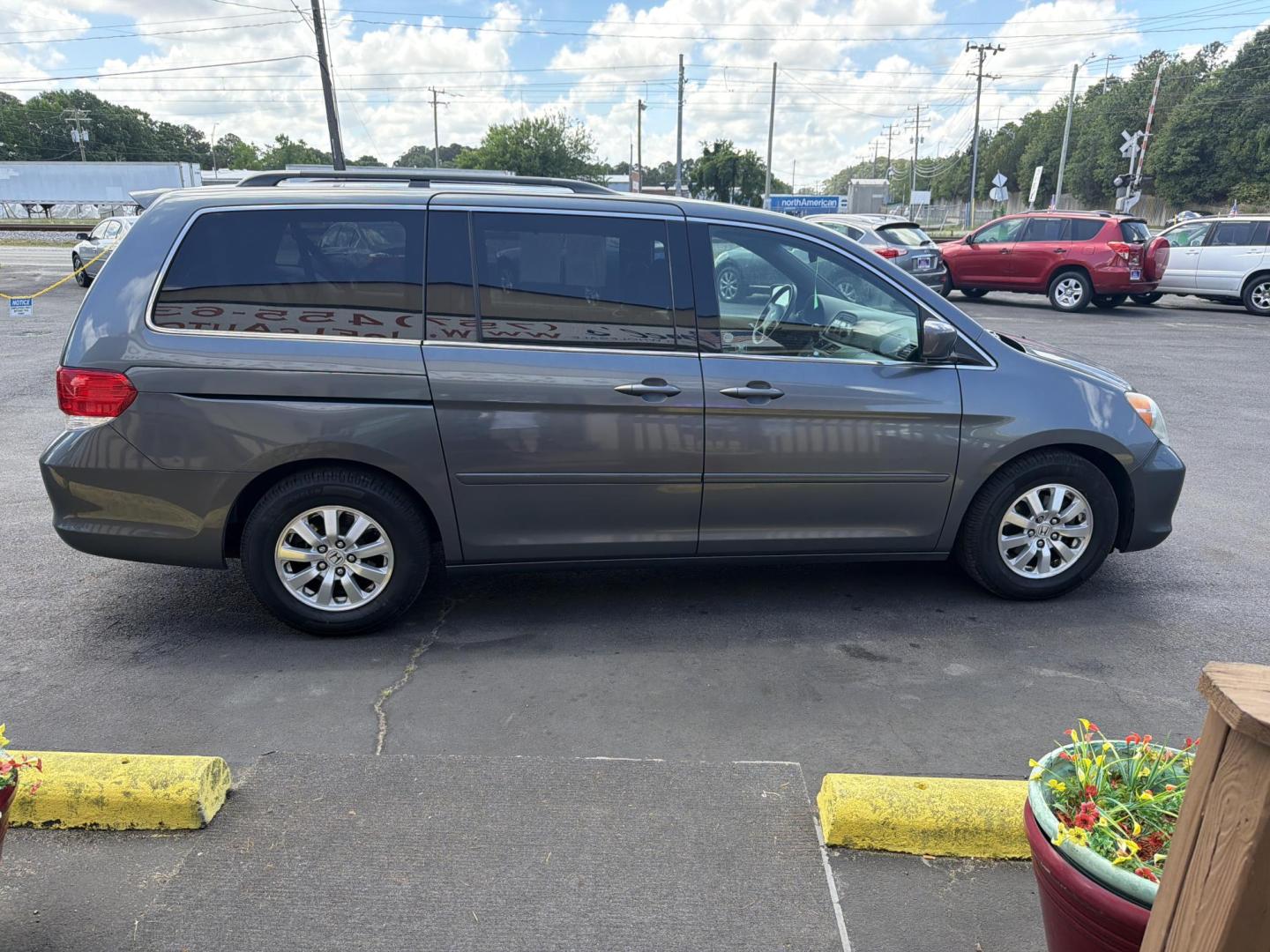 2010 Gray Honda Odyssey EX-L w/ DVD (5FNRL3H7XAB) with an 3.5L V6 SOHC 24V engine, 5-Speed Automatic transmission, located at 5700 Curlew Drive, Norfolk, VA, 23502, (757) 455-6330, 36.841885, -76.209412 - Photo#3
