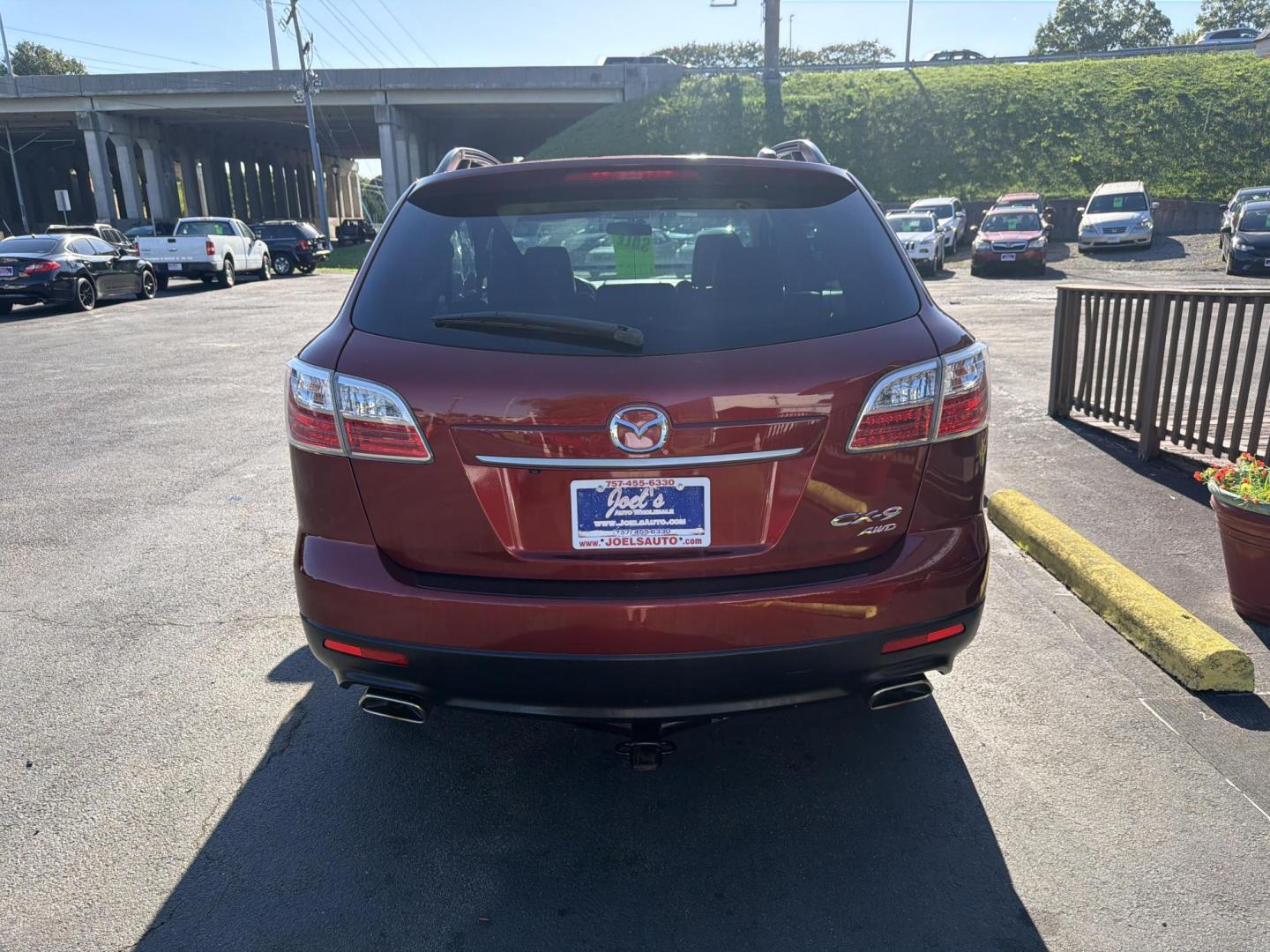 2011 red Mazda CX-9 Touring AWD (JM3TB3CV4B0) with an 3.7L V6 DOHC 24V engine, 6-Speed Automatic transmission, located at 5700 Curlew Drive, Norfolk, VA, 23502, (757) 455-6330, 36.841885, -76.209412 - Photo#2
