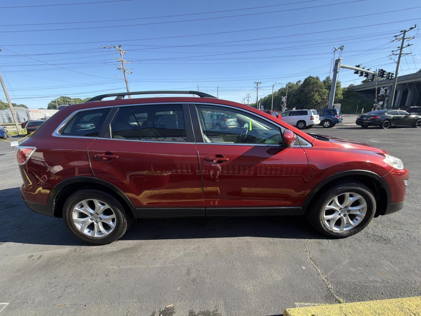 2011 red Mazda CX-9 Touring AWD (JM3TB3CV4B0) with an 3.7L V6 DOHC 24V engine, 6-Speed Automatic transmission, located at 5700 Curlew Drive, Norfolk, VA, 23502, (757) 455-6330, 36.841885, -76.209412 - Photo#3