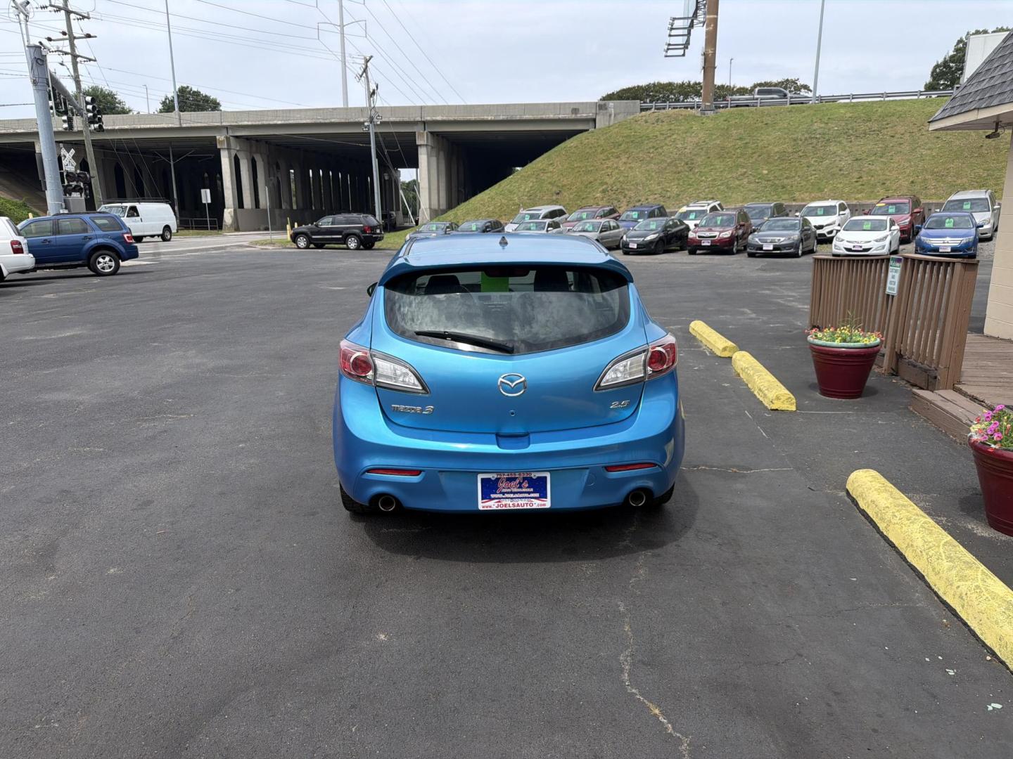 2011 Blue Mazda MAZDA3 s Sport 5-Door (JM1BL1K59B1) with an 2.5L L4 DOHC 16V engine, 5-Speed Automatic transmission, located at 5700 Curlew Drive, Norfolk, VA, 23502, (757) 455-6330, 36.841885, -76.209412 - Photo#2