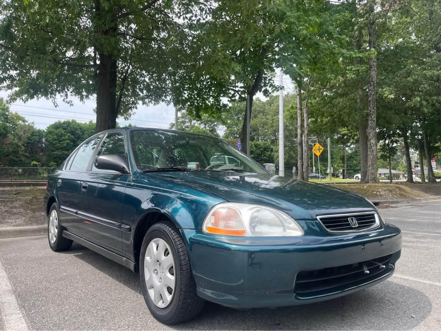 1998 Green /Tan Honda Civic LX sedan (2HGEJ6670WH) with an 1.6L L4 SOHC 16V engine, 4-Speed Automatic Overdrive transmission, located at 5700 Curlew Drive, Norfolk, VA, 23502, (757) 455-6330, 36.841885, -76.209412 - CASH DEAL NO IN HOUSE FINANCING -1998 Honda Civic Sedan -98k miles -Automatic transmission -Great condition with the exception of some missing clear coat -Ready for a new owner! -Virginia dealer $250 PROCESSING FEE INCLUDED IN PRICE - Photo#1