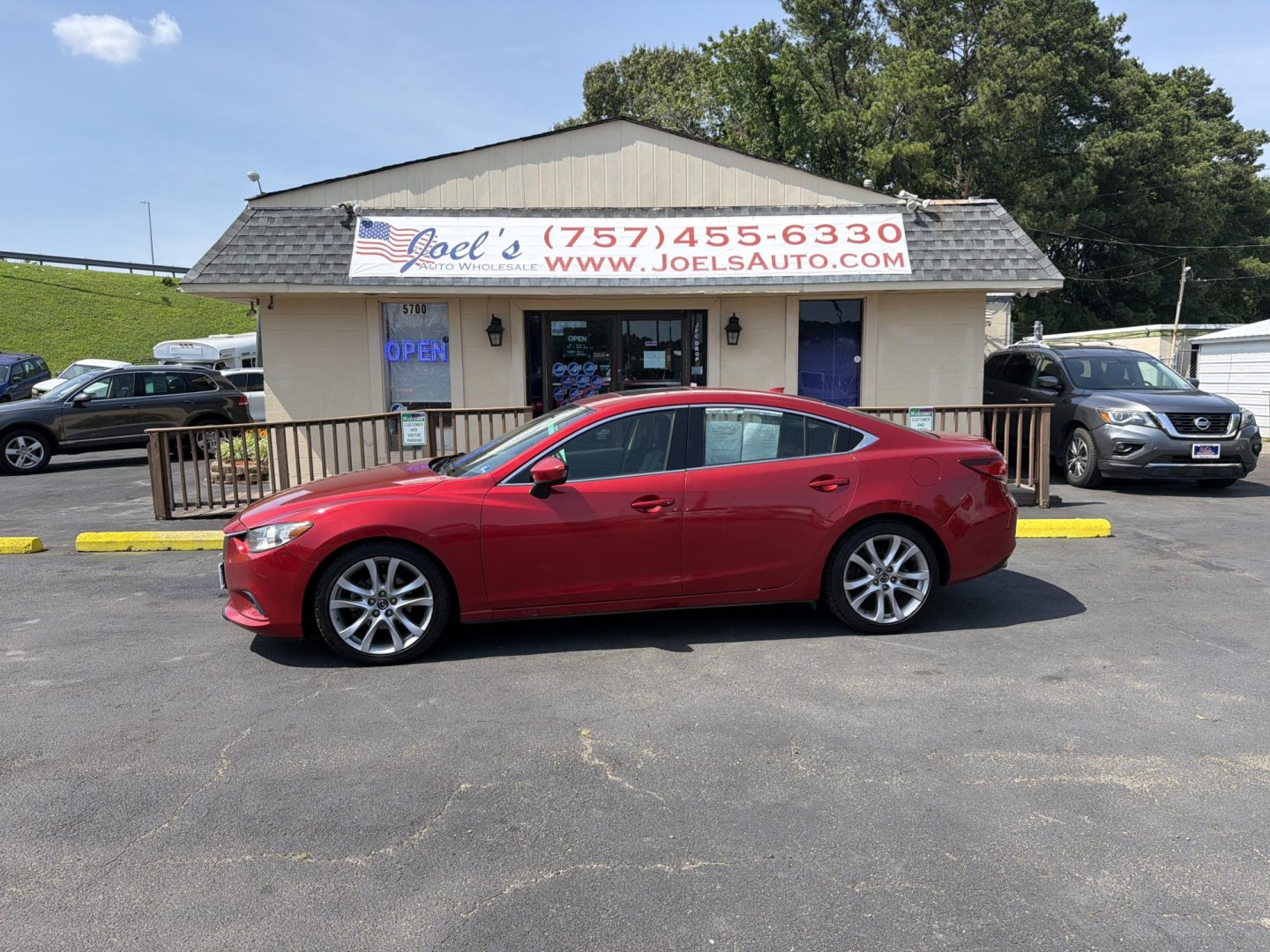 2015 Mazda EZ-6 i Touring Auto's photo