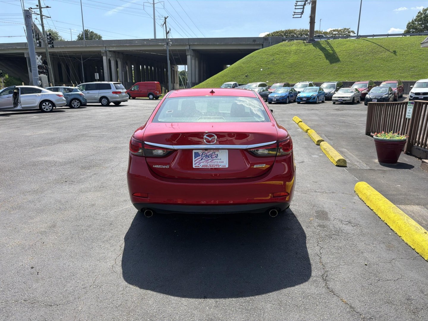 2015 red Mazda Mazda6 i Touring (JM1GJ1V57F1) with an 2.5L L4 DOHC 16V engine, 6-Speed Automatic transmission, located at 5700 Curlew Drive, Norfolk, VA, 23502, (757) 455-6330, 36.841885, -76.209412- Photo#2