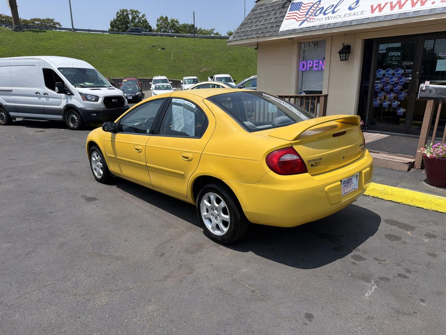 2003 Yellow Dodge Neon SXT (1B3ES56C53D) with an 2.0L L4 SOHC 16V engine, located at 5700 Curlew Drive, Norfolk, VA, 23502, (757) 455-6330, 36.841885, -76.209412- Photo#1