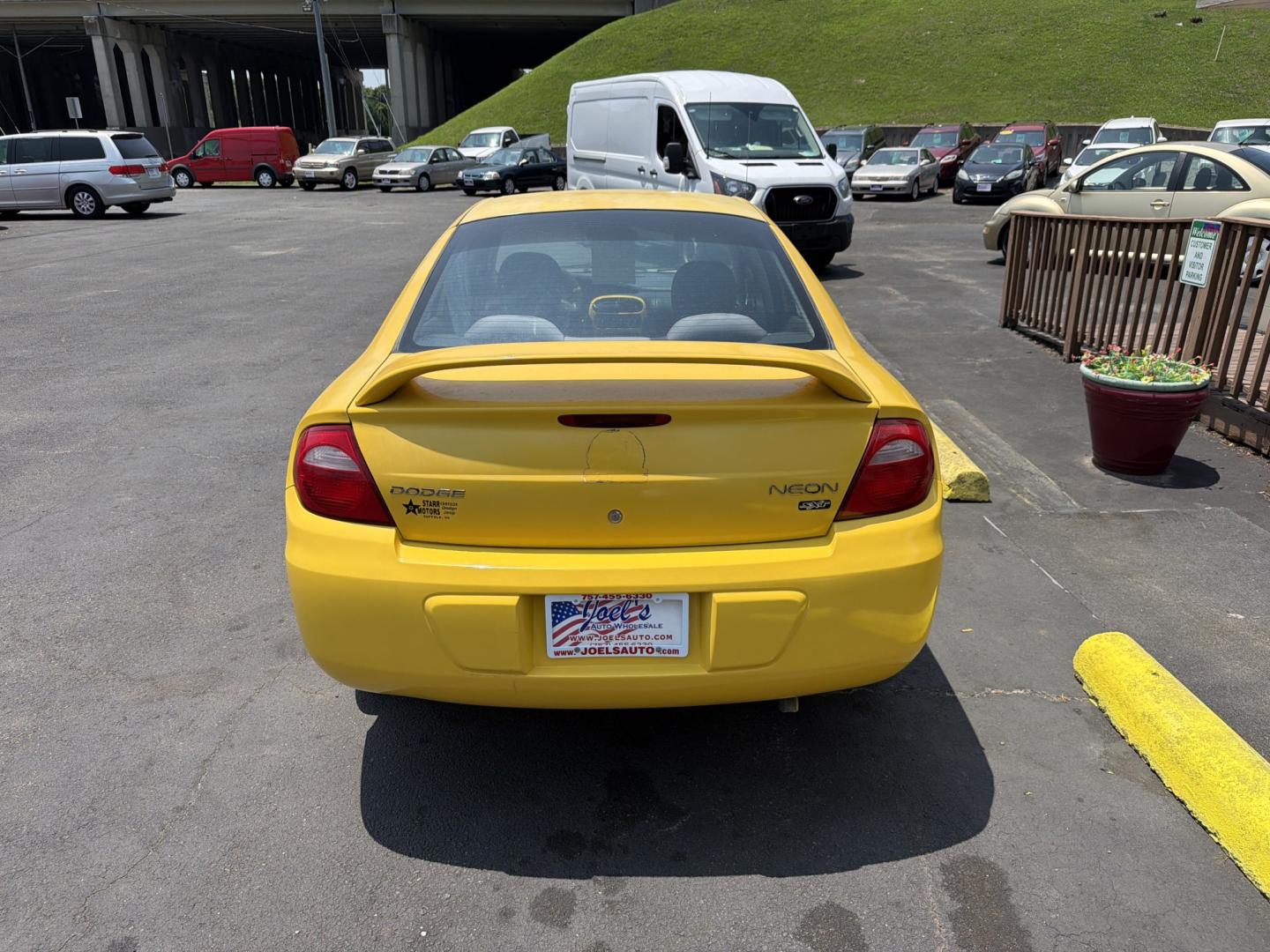 2003 Yellow Dodge Neon SXT (1B3ES56C53D) with an 2.0L L4 SOHC 16V engine, located at 5700 Curlew Drive, Norfolk, VA, 23502, (757) 455-6330, 36.841885, -76.209412- Photo#2