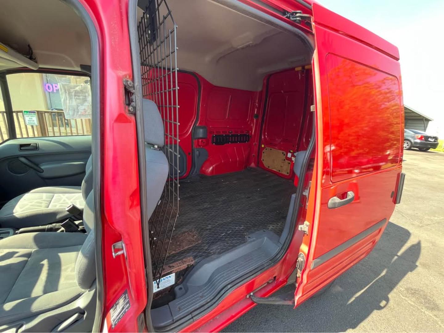2010 red /Gray Ford Transit Connect XLT (NM0LS7BN2AT) with an 2.0L L4 DOHC 16V engine, 4A transmission, located at 5700 Curlew Drive, Norfolk, VA, 23502, (757) 455-6330, 36.841885, -76.209412 - -2010 Ford Transit Connect -45k original miles -Fresh paint job! -New state inspection -Fresh oil change -4 new tires -Cold AC Hot Heat -Ready to work again -Virginia dealer $250 processing fee INCLUDED in the price!!- Photo#15