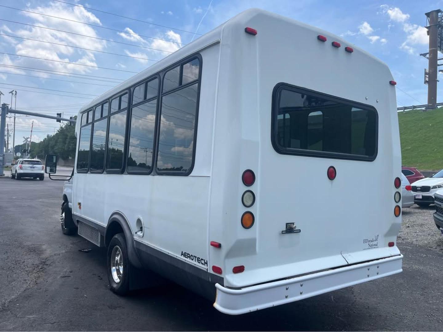 2005 WHITE /Gray Ford Econoline E-450 (1FDXE45S35H) with an 6.8L V10 SOHC 20V engine, Automatic transmission, located at 5700 Curlew Drive, Norfolk, VA, 23502, (757) 455-6330, 36.841885, -76.209412 - CASH DEAL NO IN HOUSE FINANCING -2005 Ford E450 15 Passenger Bus -23k original miles -New state inspection -New batteries -Leaks some water inside from the roof emergency exit -Ready for a new home -Virginia dealer $250 processing fee- Photo#5