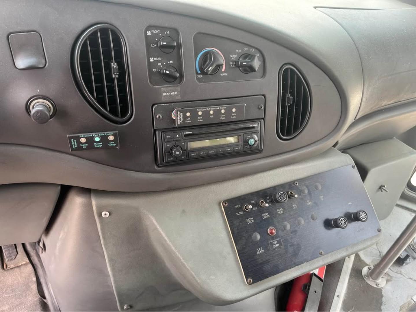 2005 WHITE /Gray Ford Econoline E-450 (1FDXE45S35H) with an 6.8L V10 SOHC 20V engine, Automatic transmission, located at 5700 Curlew Drive, Norfolk, VA, 23502, (757) 455-6330, 36.841885, -76.209412 - CASH DEAL NO IN HOUSE FINANCING -2005 Ford E450 15 Passenger Bus -23k original miles -New state inspection -New batteries -Leaks some water inside from the roof emergency exit -Ready for a new home -Virginia dealer $250 processing fee- Photo#10