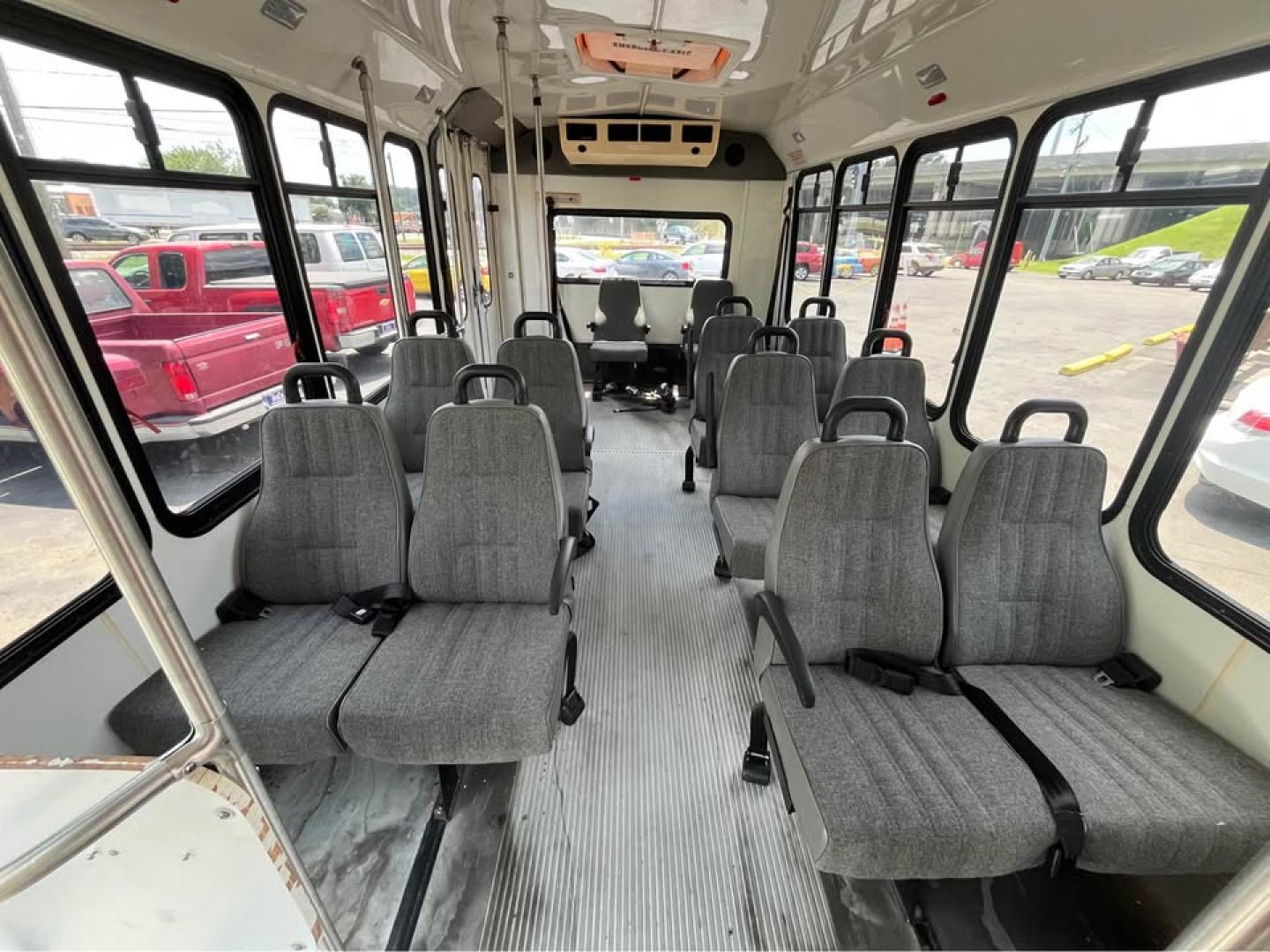 2005 WHITE /Gray Ford Econoline E-450 (1FDXE45S35H) with an 6.8L V10 SOHC 20V engine, Automatic transmission, located at 5700 Curlew Drive, Norfolk, VA, 23502, (757) 455-6330, 36.841885, -76.209412 - CASH DEAL NO IN HOUSE FINANCING -2005 Ford E450 15 Passenger Bus -23k original miles -New state inspection -New batteries -Leaks some water inside from the roof emergency exit -Ready for a new home -Virginia dealer $250 processing fee- Photo#12