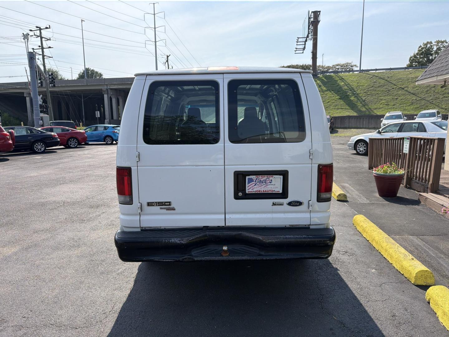 2011 WHITE Ford E-Series Van E-150 (1FTNE1EWXBD) with an 4.6L V8 SOHC 16V engine, 4A transmission, located at 5700 Curlew Drive, Norfolk, VA, 23502, (757) 455-6330, 36.841885, -76.209412- Photo#2