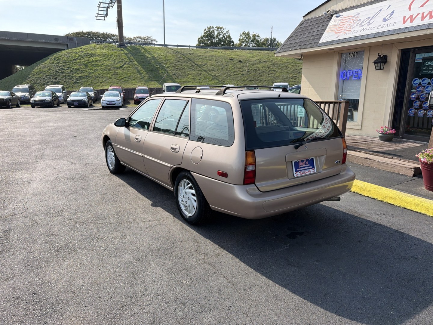 1999 BROWN Ford Escort Wagon SE (3FAFP15P8XR) with an 2.0L L4 SOHC 8V engine, Manual 5 Speed transmission, located at 5700 Curlew Drive, Norfolk, VA, 23502, (757) 455-6330, 36.841885, -76.209412- Photo#1
